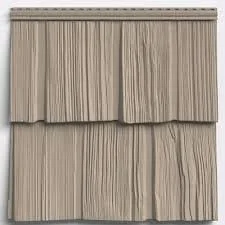 A beige, horizontal sliding window covered by beige outdoor curtains with a vertical striped pattern.