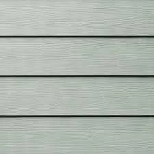 Close-up of light gray horizontal wooden siding on a building