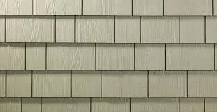 Close-up of beige horizontal siding on a building.