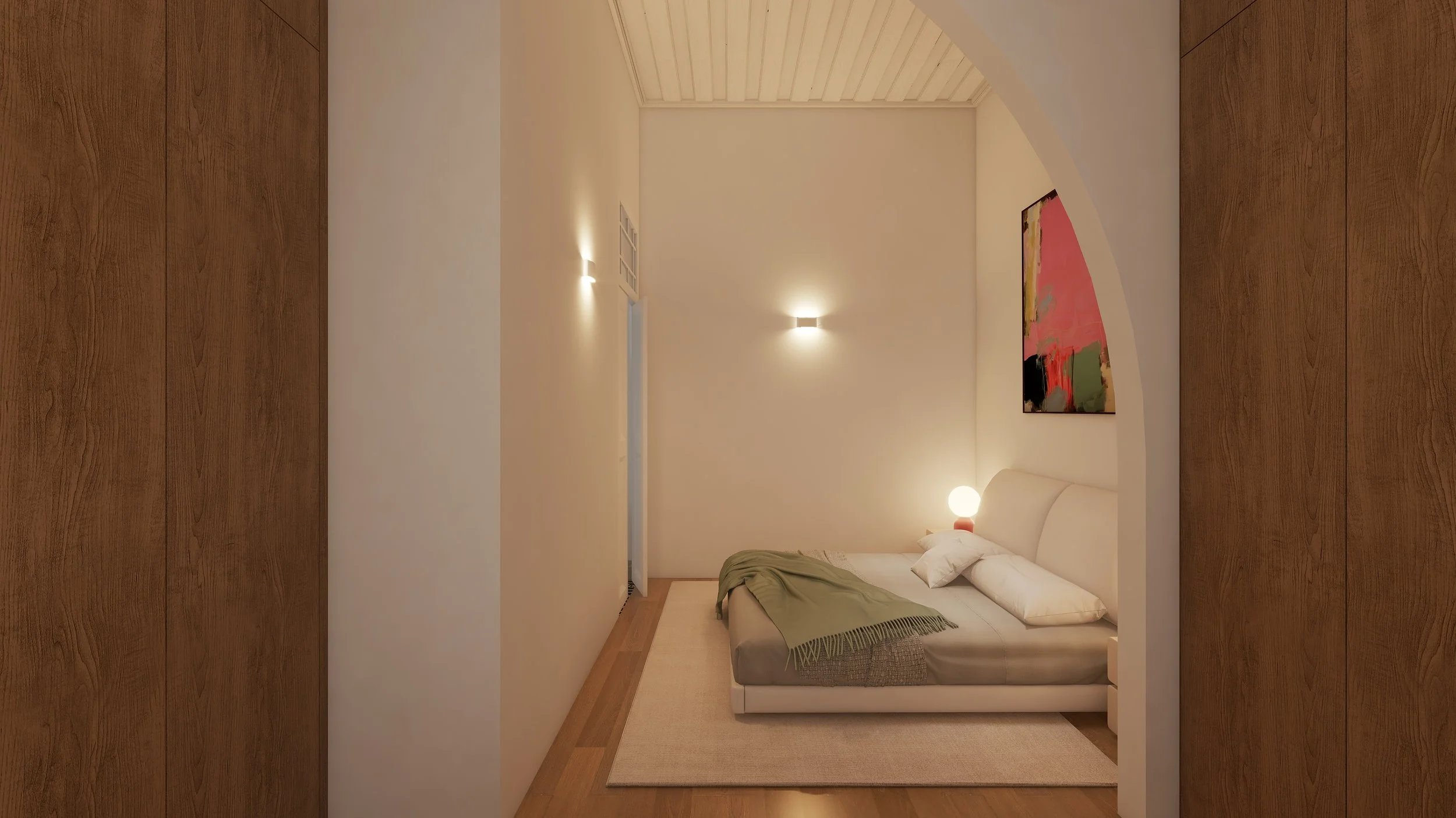 Quarto com parede branca, cama de casal com roupa branca, edredom cinza e uma manta verde, ao lado de um abajur aceso. Há uma pintura abstrata na parede atrás da cama. O chão é de madeira e há um tapete bege sob a cama, cercado por paredes brancas com iluminação suave.