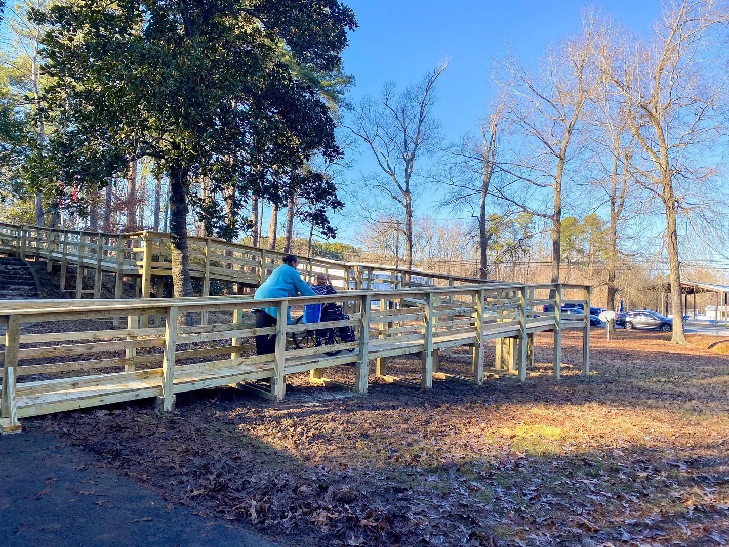 A few weeks ago, after days of rain and ice, volunteers showed up to build what would become the longest ramp in project:HOMES history, stretching an incredible 132 feet. It took 22 H-frames, 228 deck boards, and a coordinated crew working assembly-l