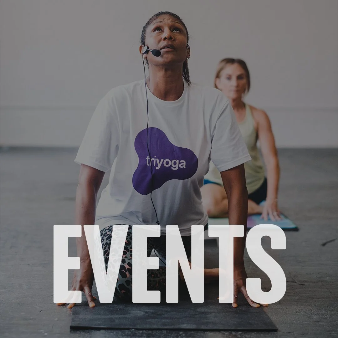 A woman participating in a yoga class, wearing a white t-shirt with the word "triyoga" and a purple logo, on a yoga mat, with another woman in the background. The word "EVENTS" is displayed at the bottom of the image.