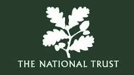 The logo of The National Trust featuring a white oak branch with leaves on a dark green background.
