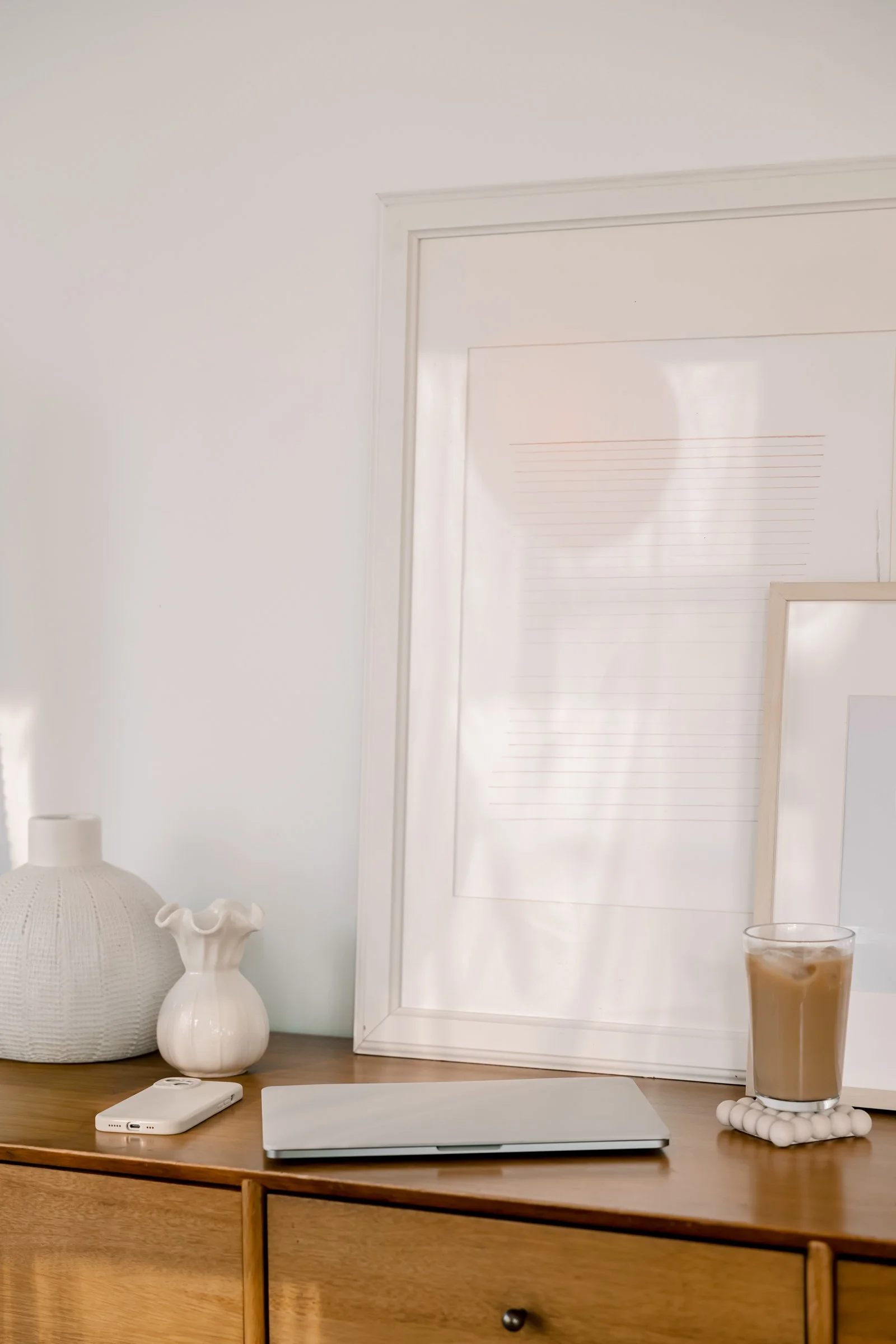 Soft light on frame and desktop representing spiritual renewal and reconnecting with faith after exhaustion