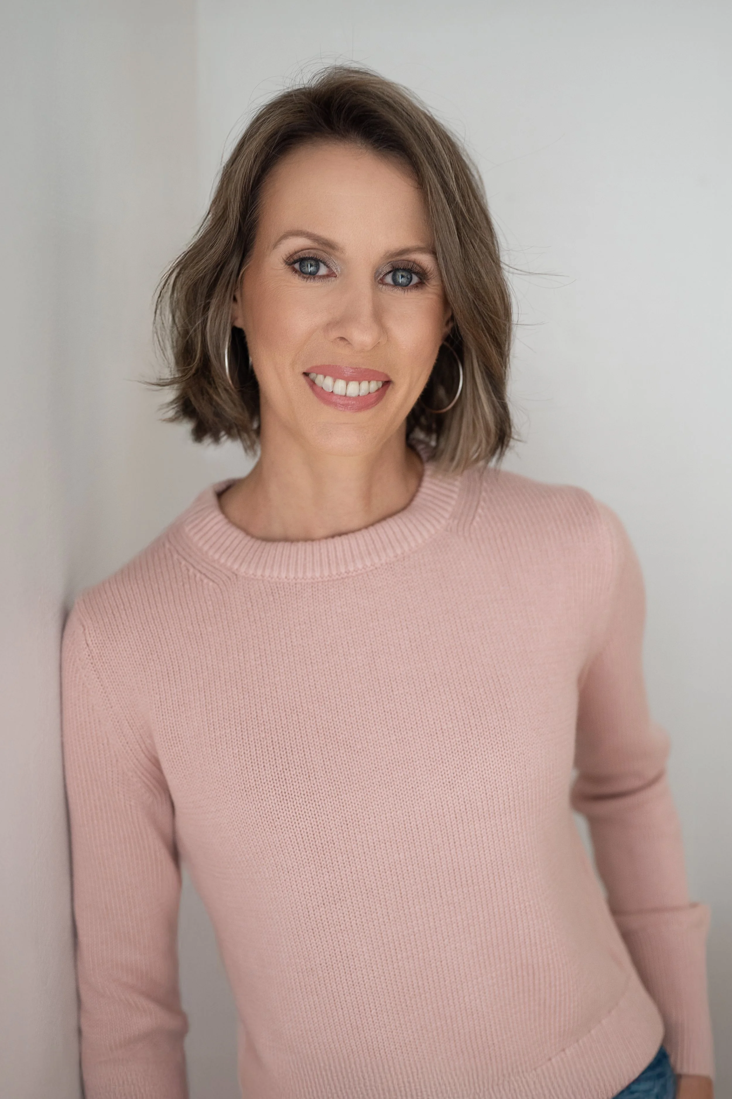 Sarah Waycaster, registered nurse and functional medicine practitioner, smiling warmly