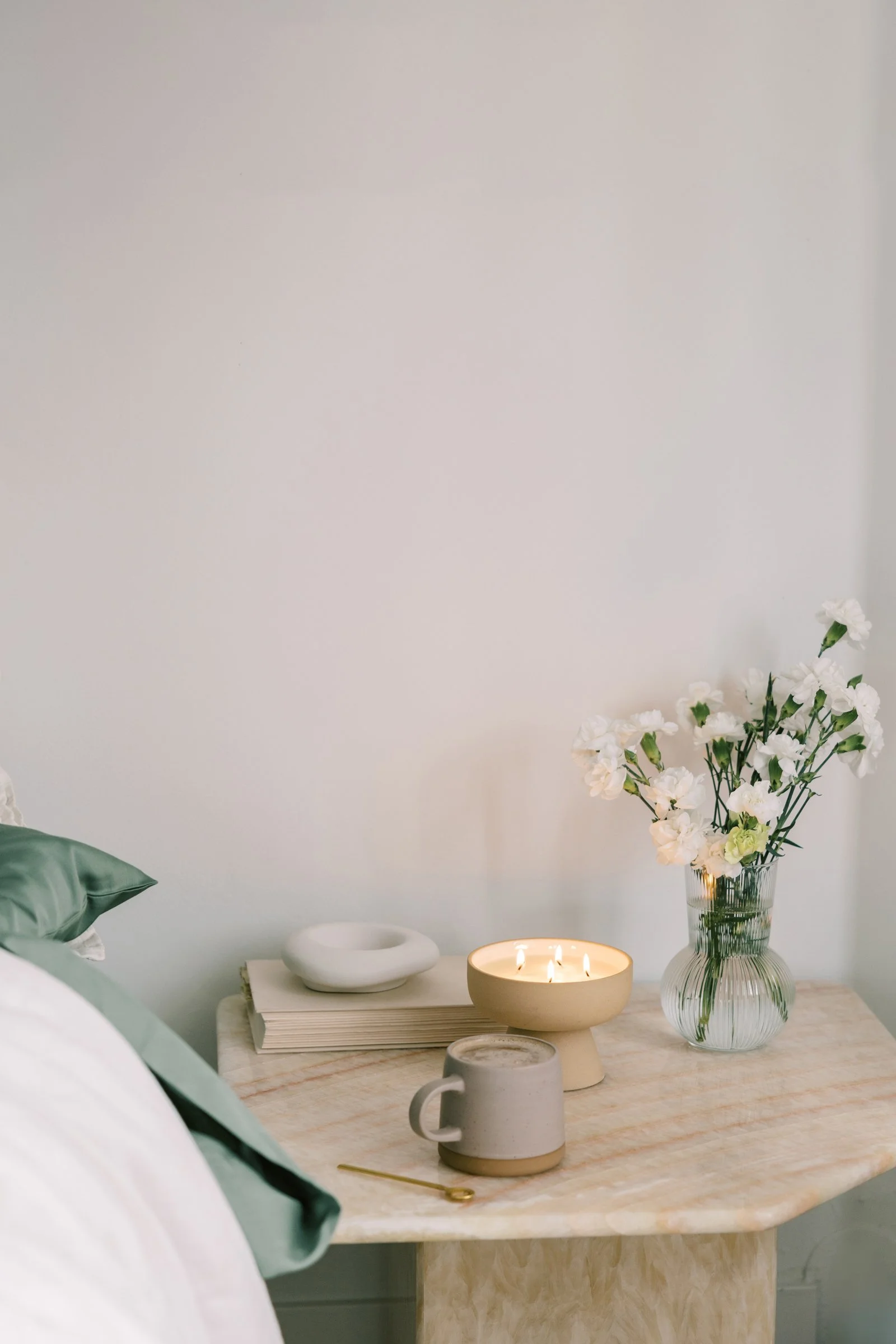 Soft, warm lifestyle image representing rest and renewal for women in a healing journey
