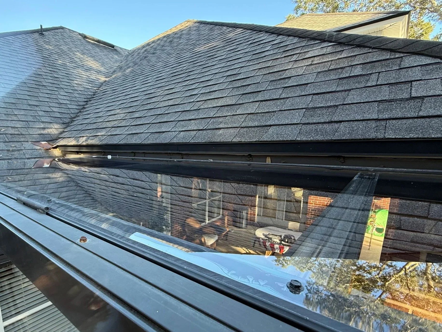 Person holding a happy yellow Labrador puppy.