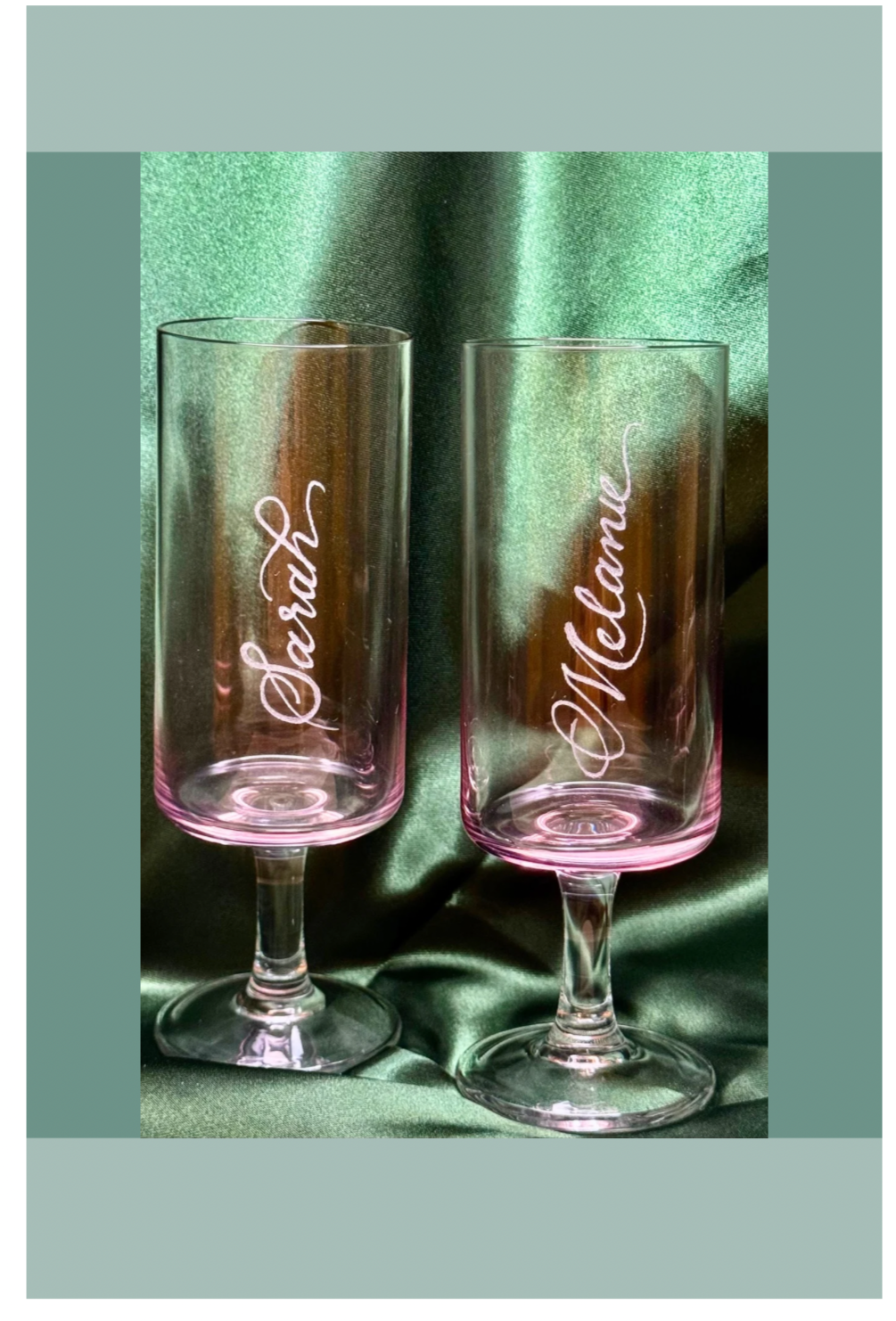 Hand-engraved calligraphy on wo pink-tinted champagne flutes