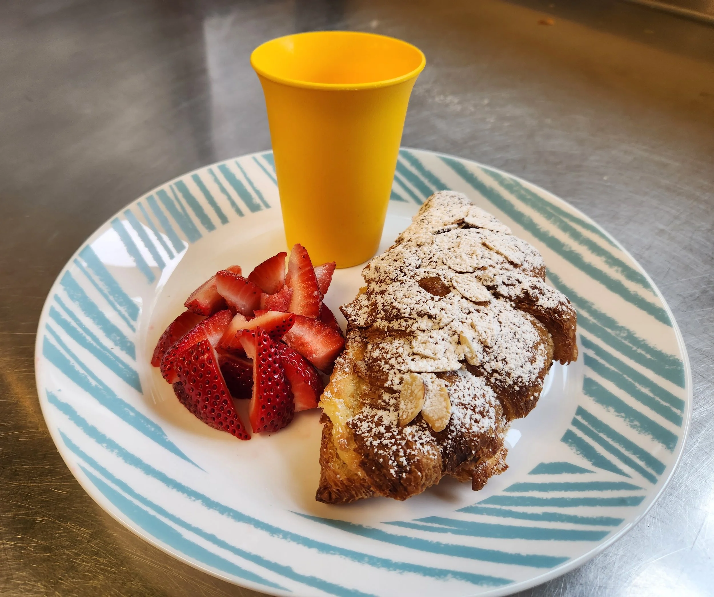 Almond croissant and strawberries