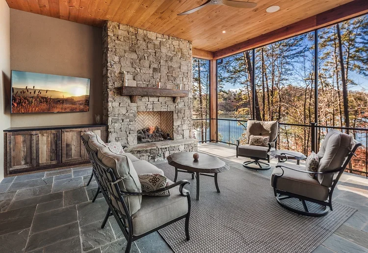 Covered Porch with Fireplace Overlooking Lake Keowee