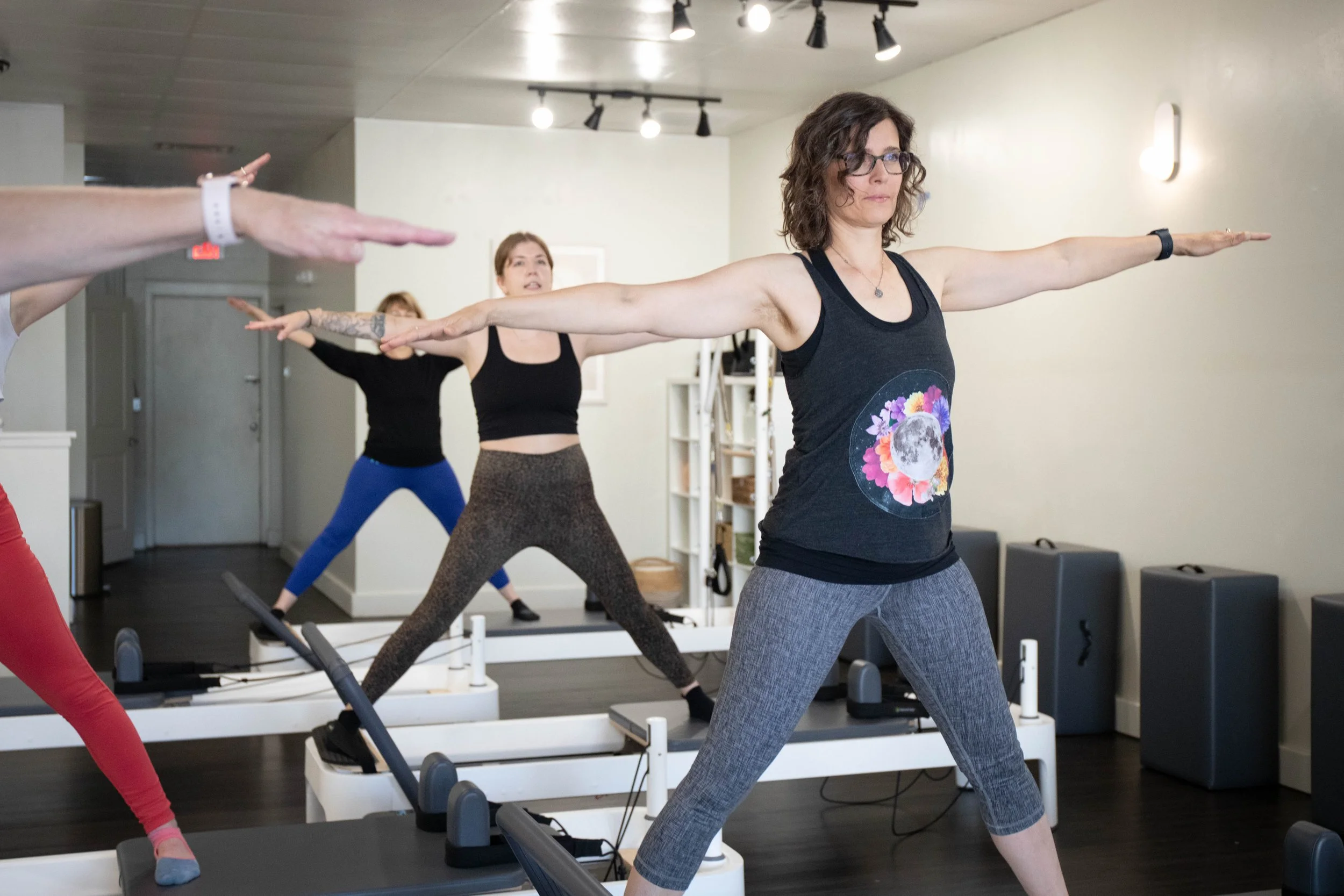 people doing reformer pilates