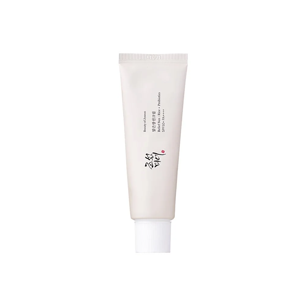 A white tube of skincare product with black and red Japanese characters and some English text, including 'Resort Sun Rice & Probiotics SPF 50+ PA+++'.