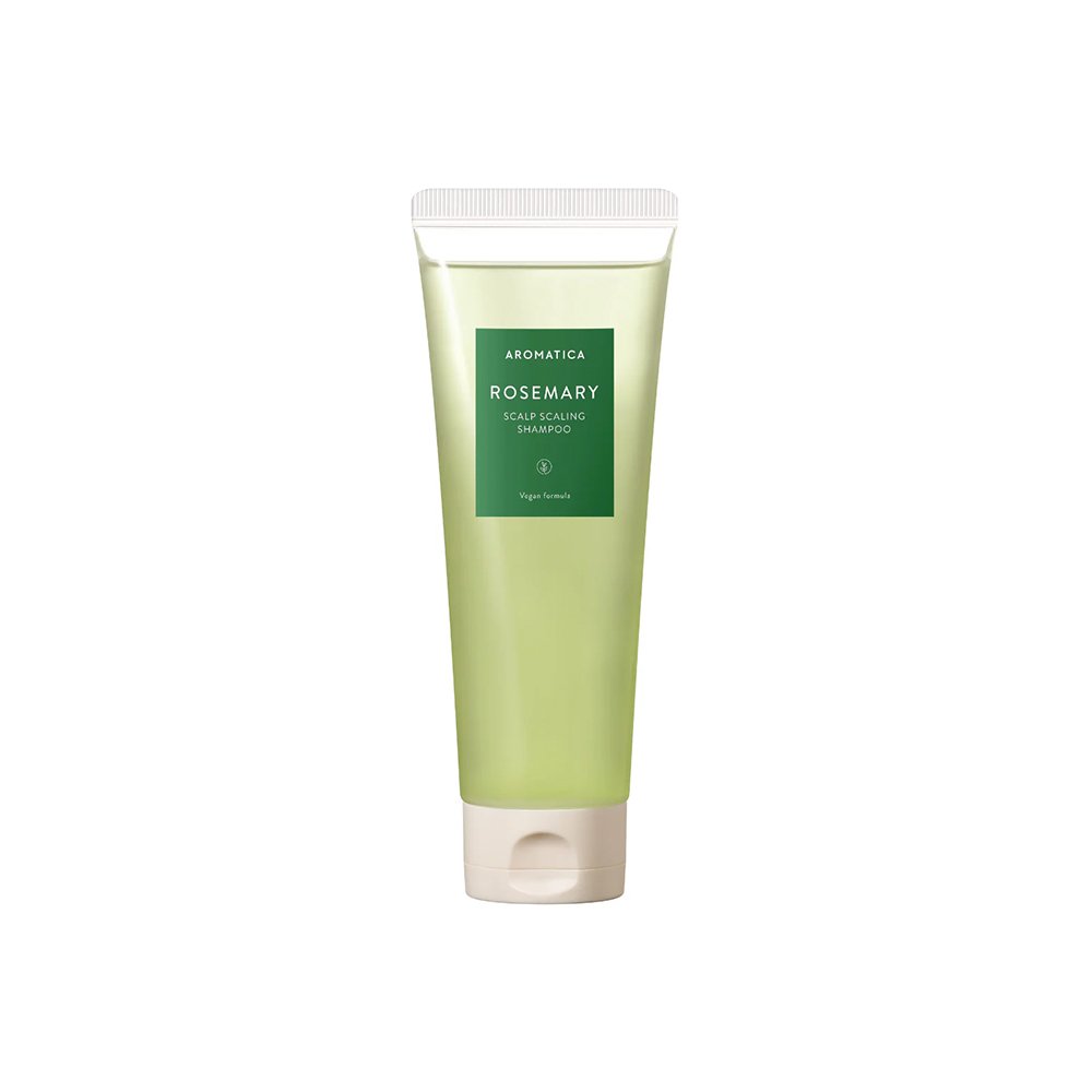 A tube of Aromatica rosemary scalp scaling shampoo with a green label and white cap.