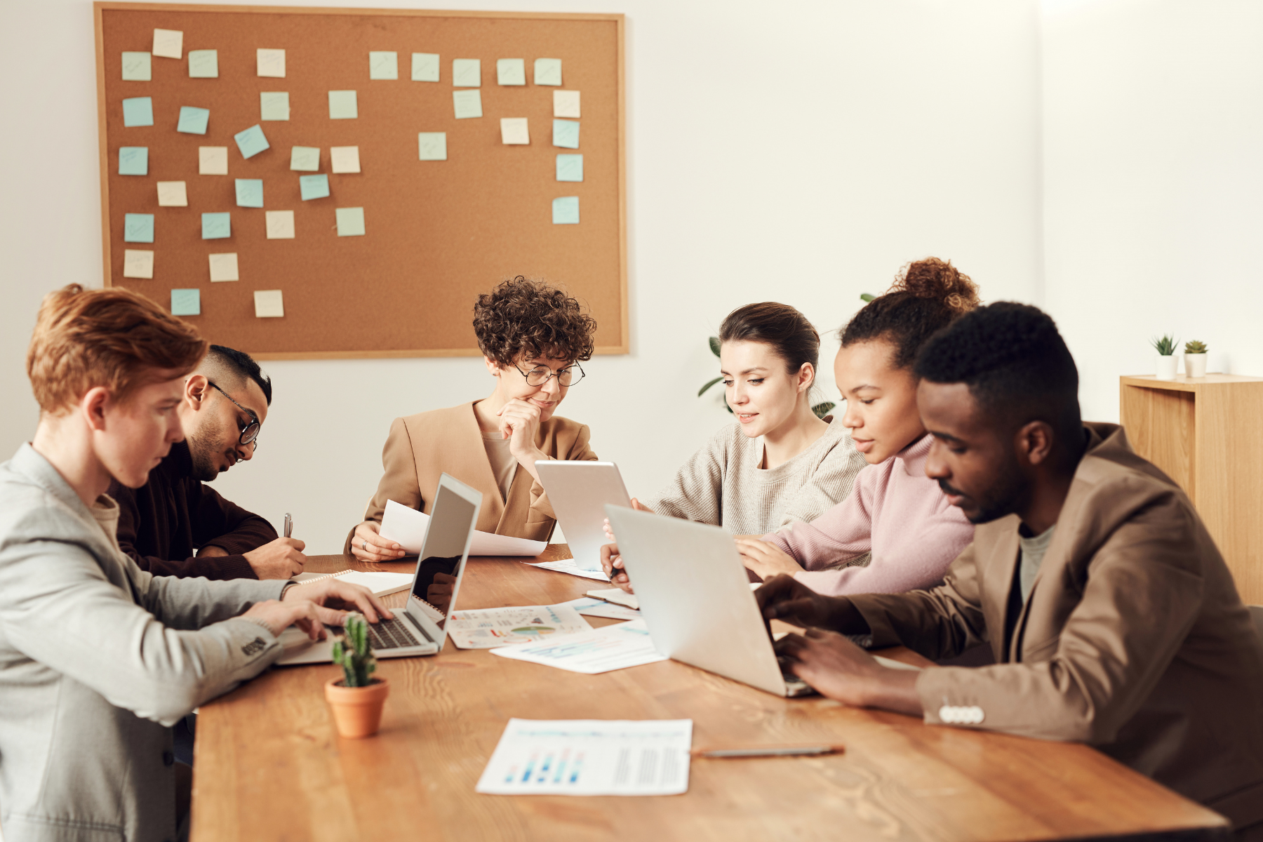 HR consultant guiding team through strategic planning and employee support discussion.