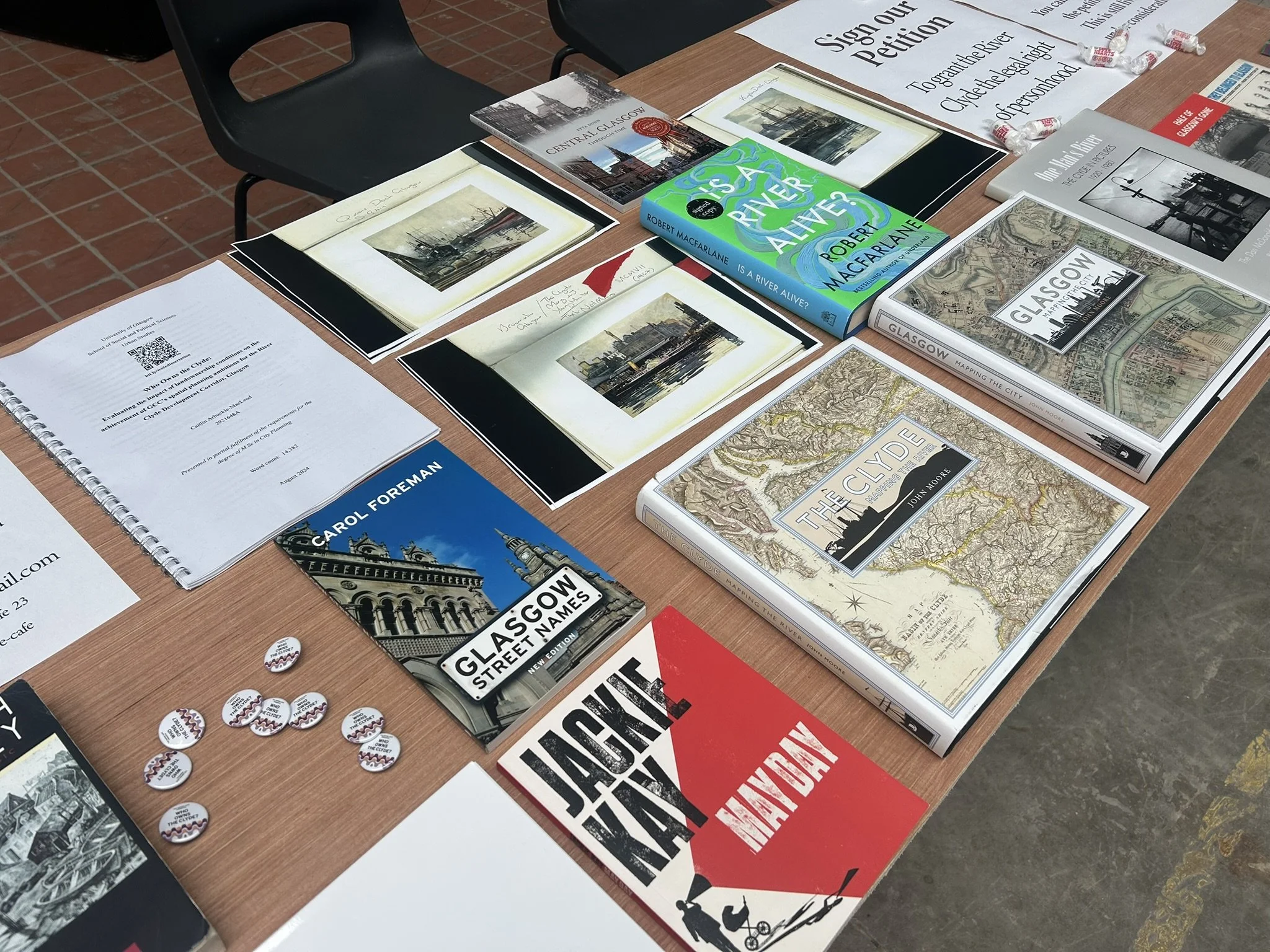 Books and research for review at the Mapathon