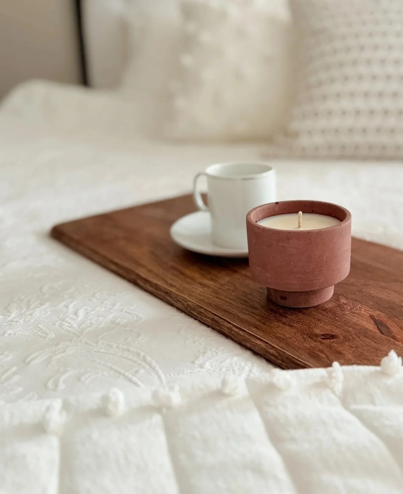 Our pedestal cement vessel is one of a kind. Beautiful, creamy wax in an original cement vessel candle.