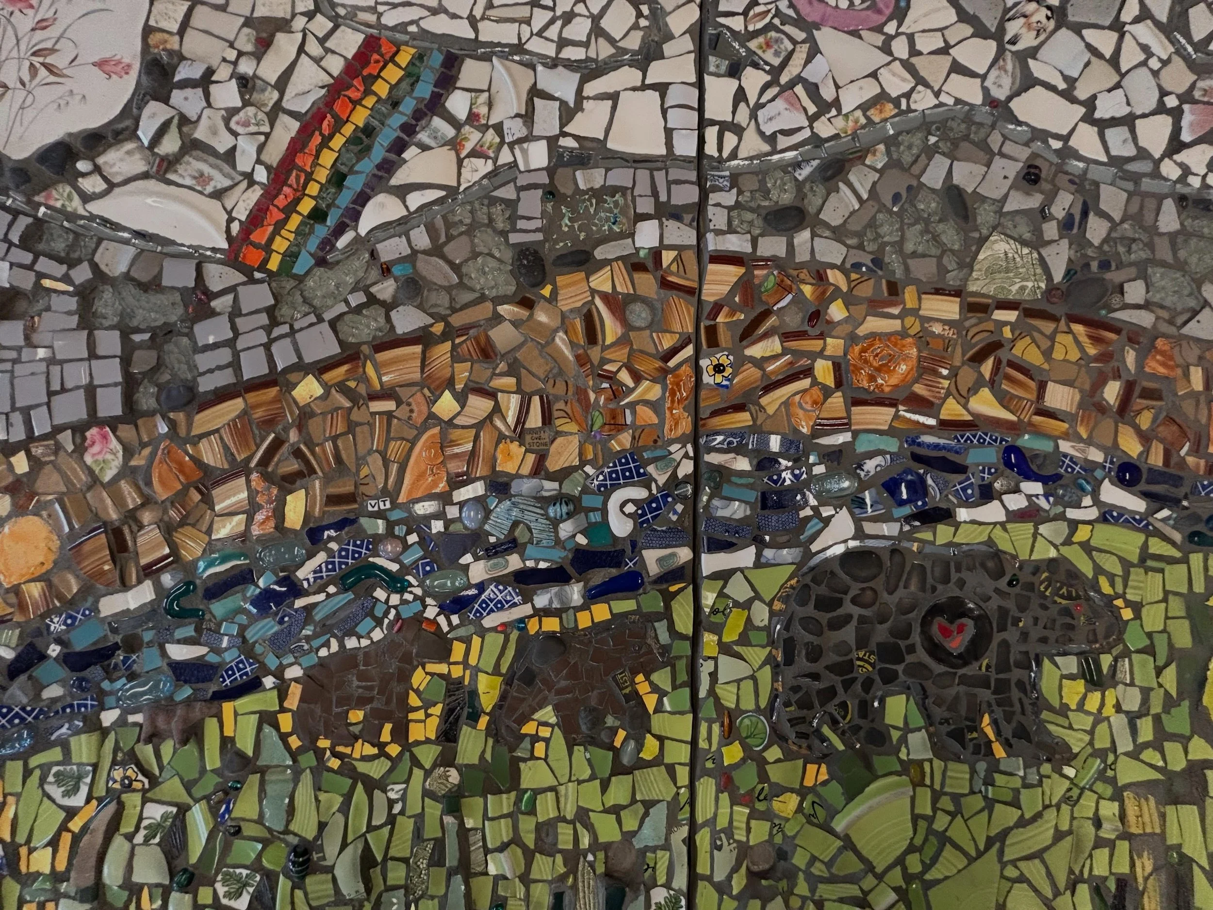 I've spent this past week at Danville HS as a full time artist in residence. I worked with about 40 kids (6 different classes)to teach and create this 3' x 6' mosaic that will adorn the school's entryway. The kids were all into the process in one way