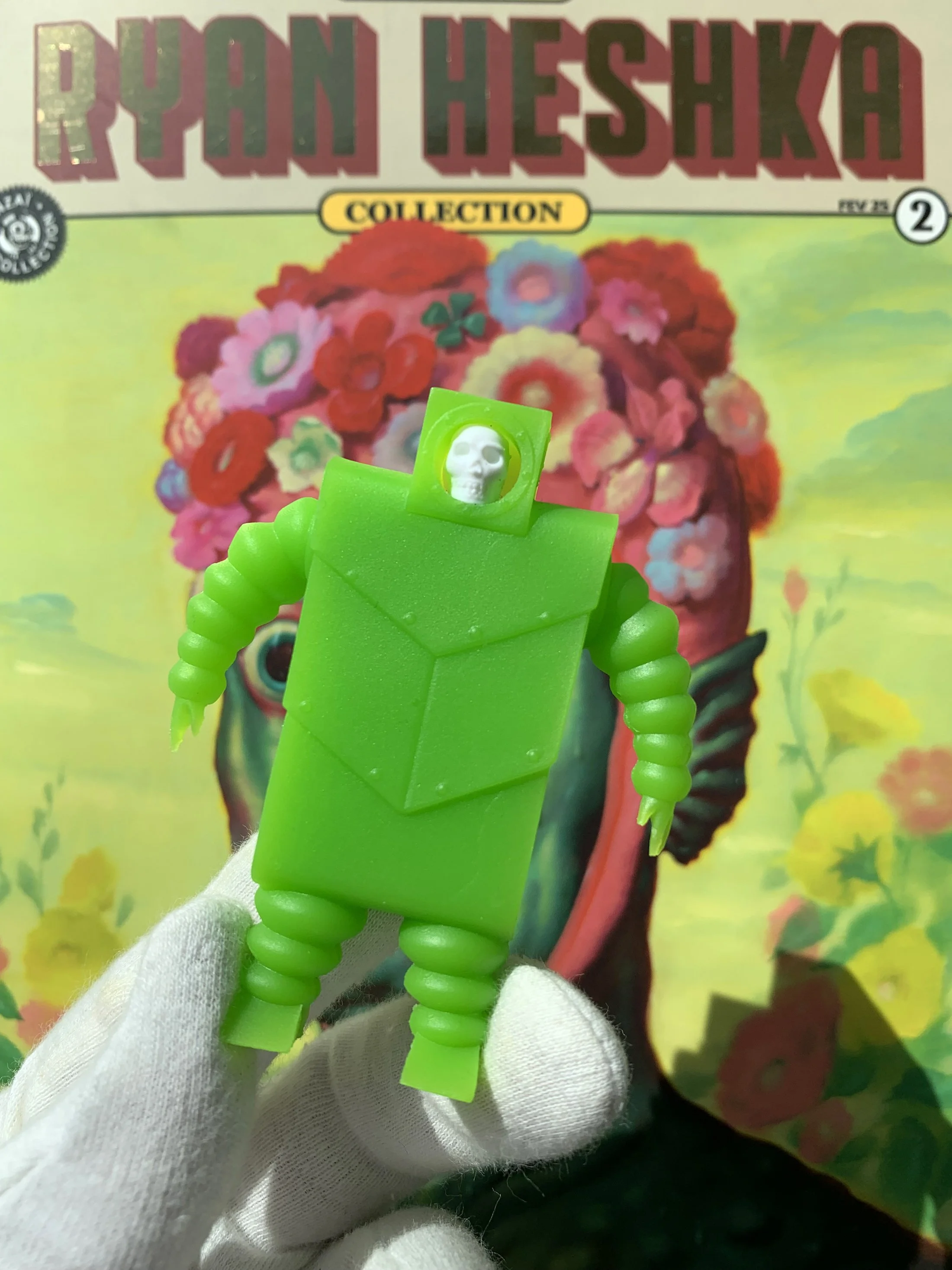 “CALCIFIER X-20” figurine with "Art of Ryan Heshka" magazine