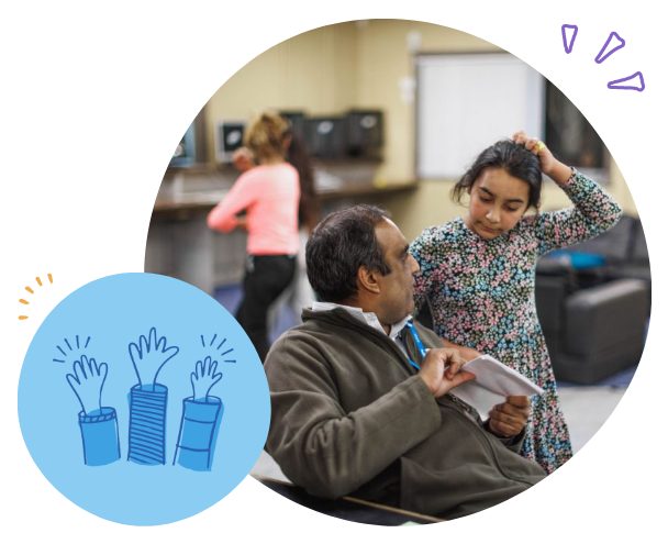 A young girl talking to an older man in a waiting room, with another woman in the background.