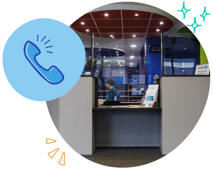 A person at a reception desk in a modern office or technology center with a curved ceiling and glass walls, accompanied by overlays of a phone icon, sparkles, and lines indicating communication or activity.