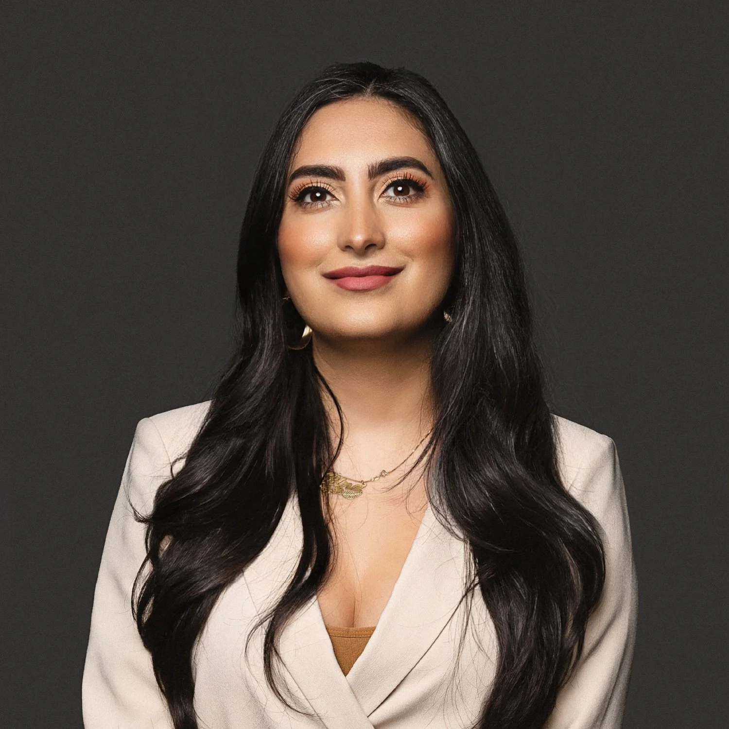 Headshot of Rina Zattam, Administration