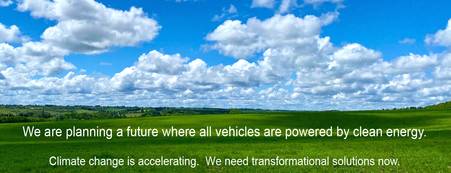 A green field with lush grass under a bright blue sky filled with fluffy white clouds, displaying a message about planning a future with clean energy vehicles to combat climate change.
