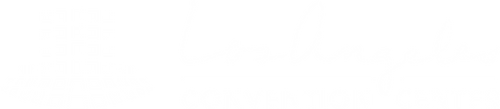 Logo of the Los Angeles Convention Center in white featuring stylized grid sphere and text.