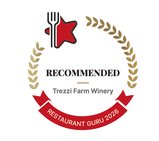 Badge with a fork and star, laurel wreath, and text recommending Trezzi Farm Winery and Restaurant Guru 2026