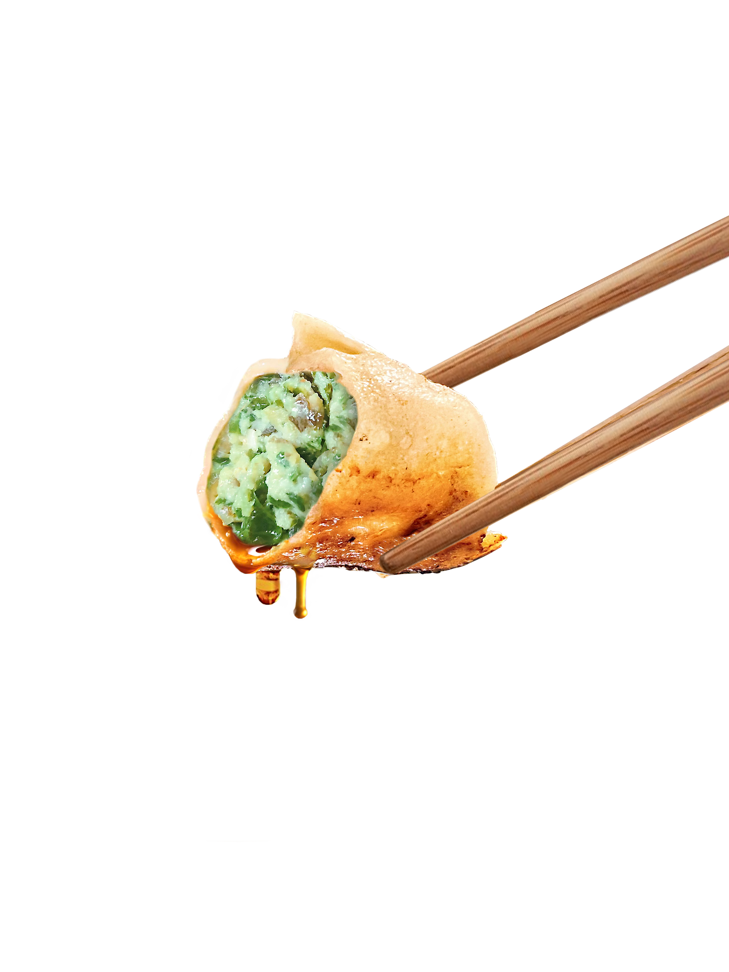 Close-up of a gyoza (Japanese dumpling) held by chopsticks, showing its partially bitten side with green vegetable filling and a droplet of sauce.