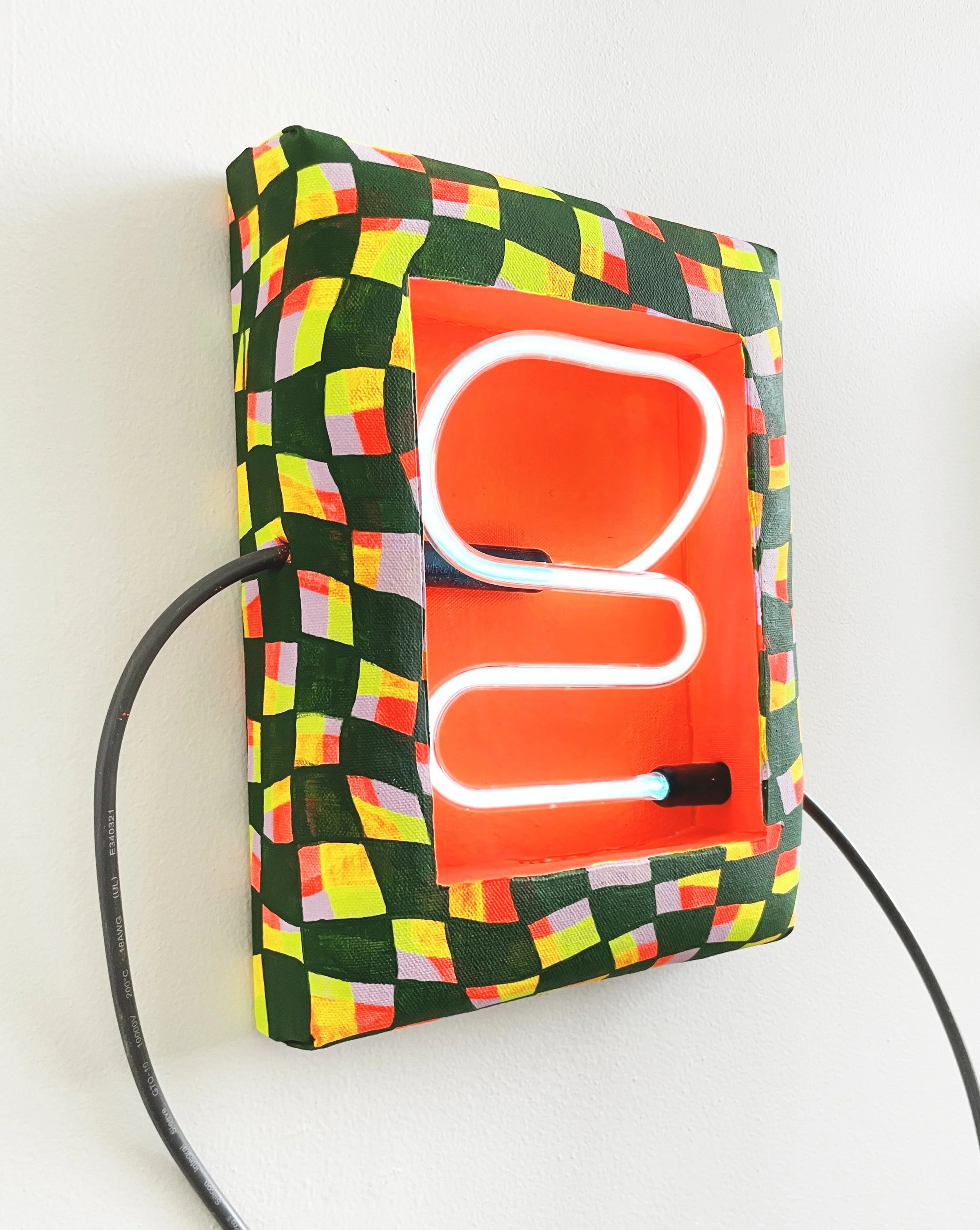 "Light Squiggle," 2025,
Acrylic, DayGlo, Flashe and neon lamp on canvas, foam, panel,
12" x 9" x 2.5"