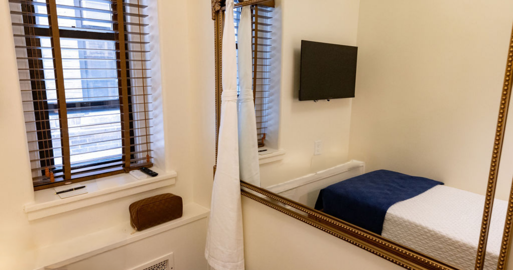 west village eurohostel single mirror.png
