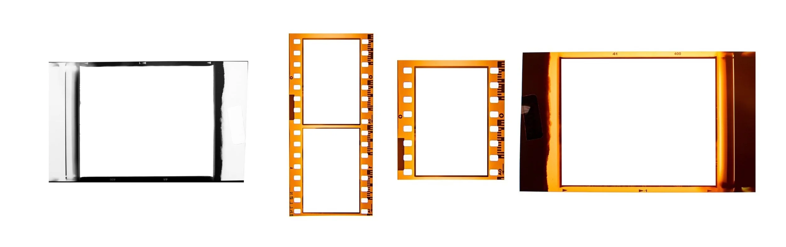 Various camera film slides, including black-and-white and color, with some showing developed film strips and frames.