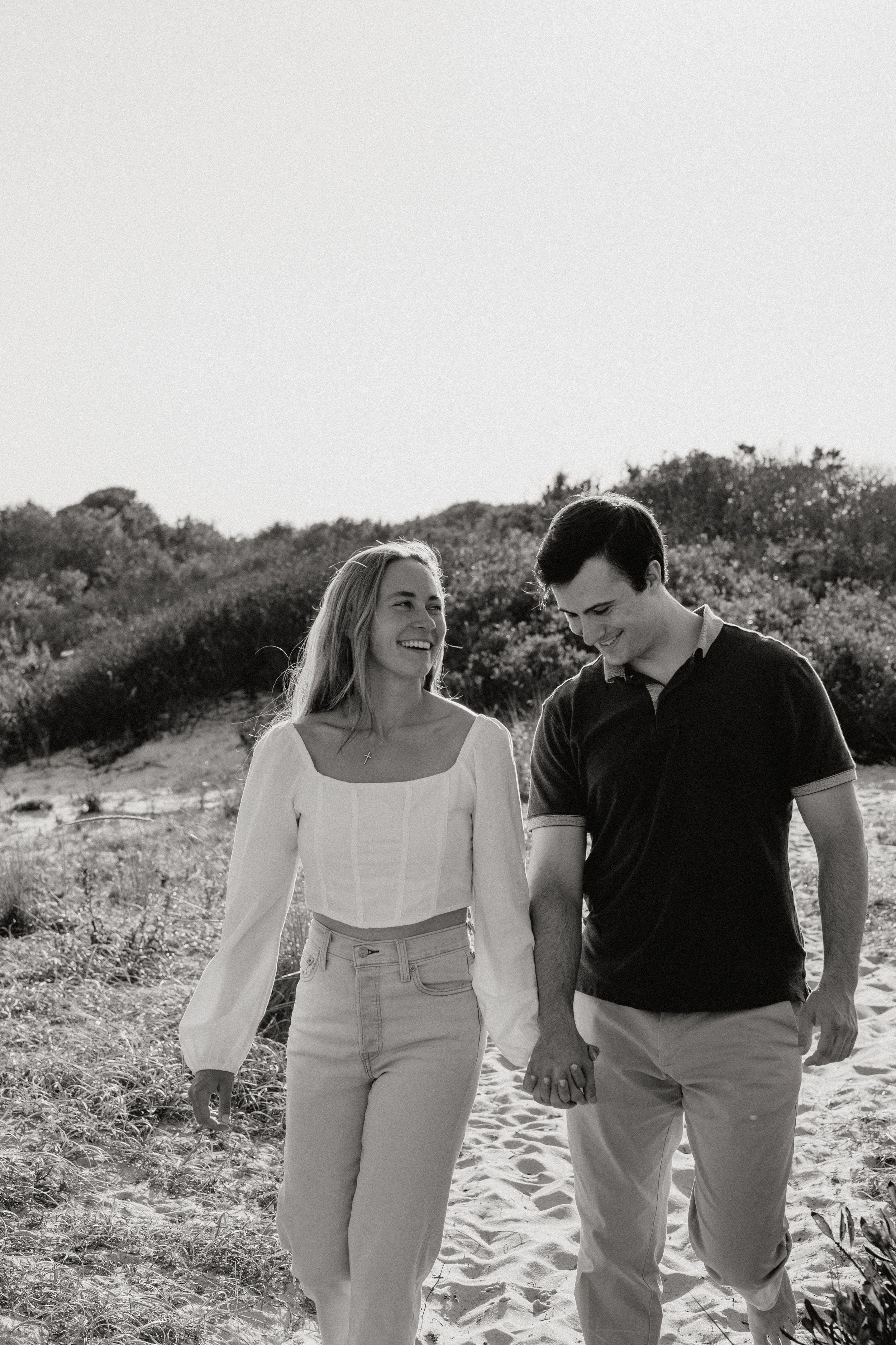 Bride and groom sharing a romantic moment during their engagement photo in Somerville, New Jersey, photographed by Dominique Paulette.