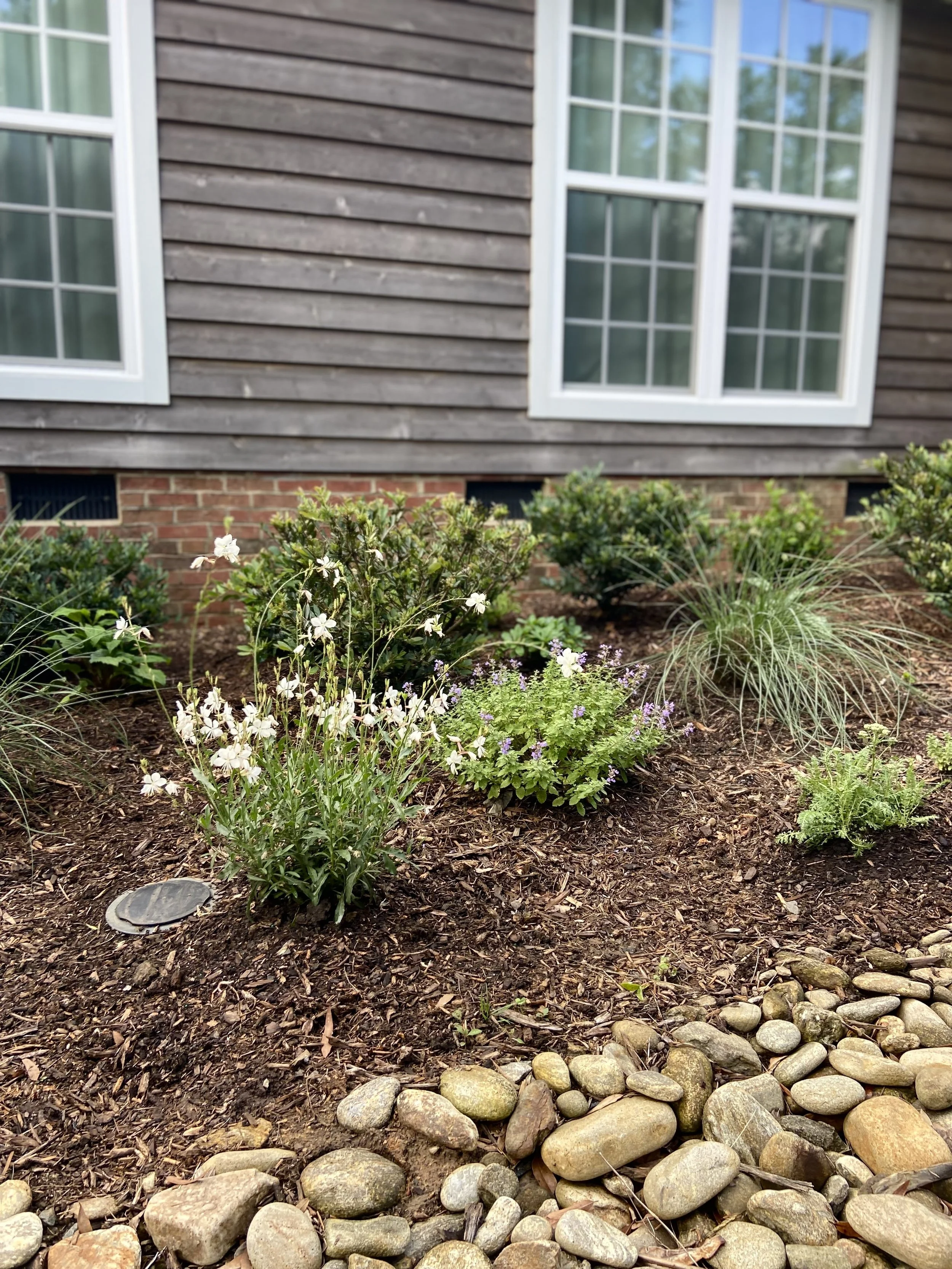 River rock helps soften the flow