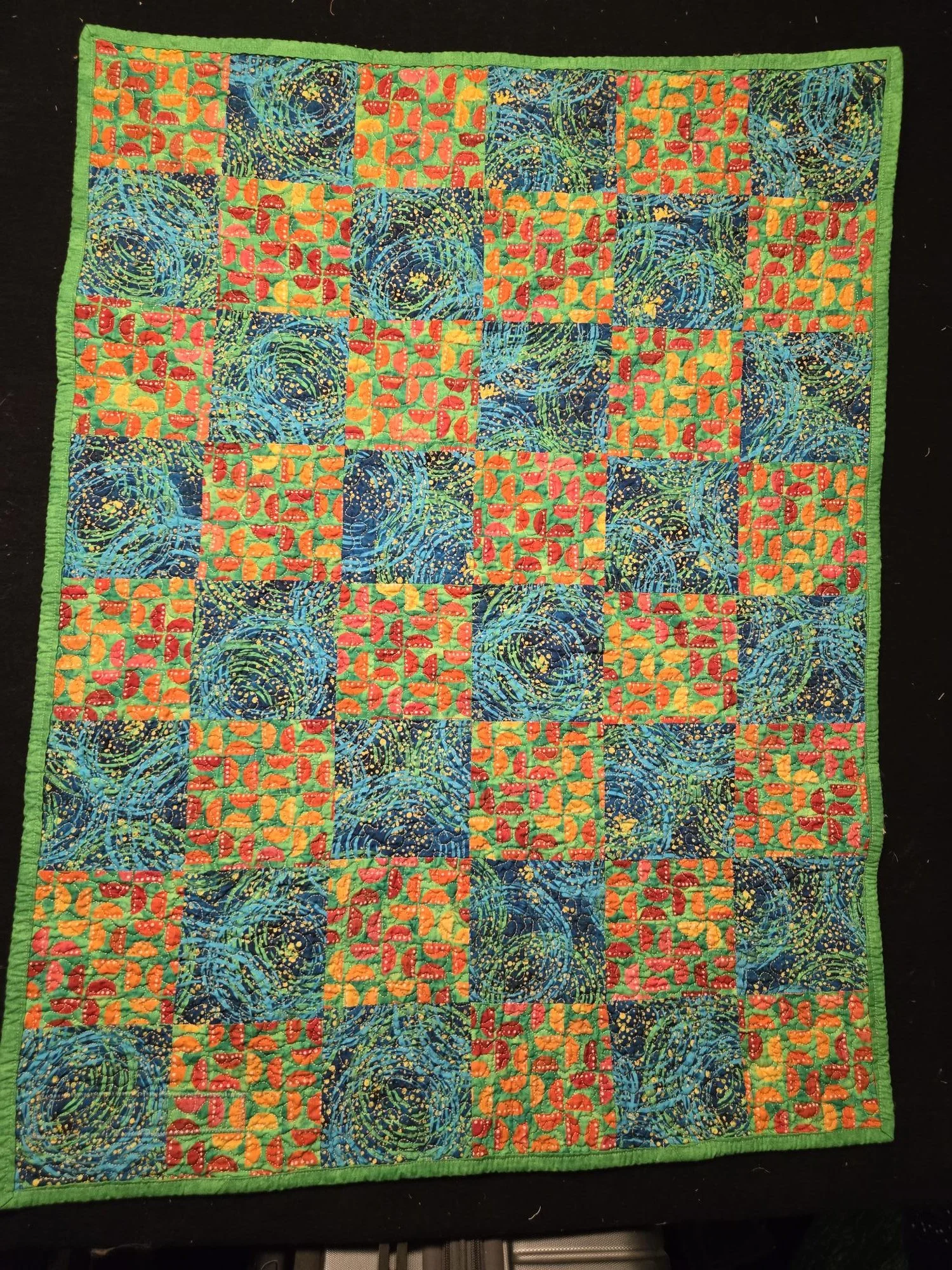 (30"x40") Baby Quilt3 Front View.  Distinct, colourful fabric design baby quilt
