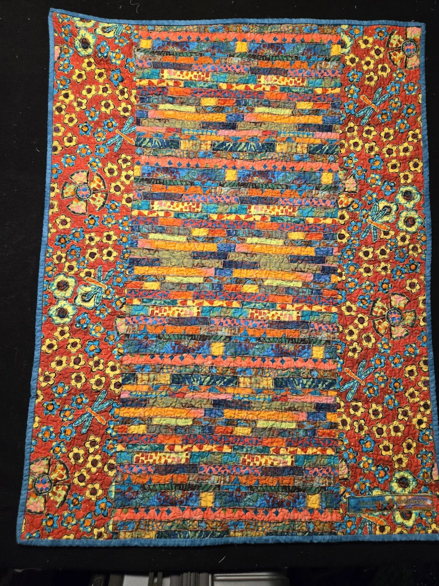 (30"x40") Baby Quilt2 Back View.  Distinct, colourful fabric design baby quilt