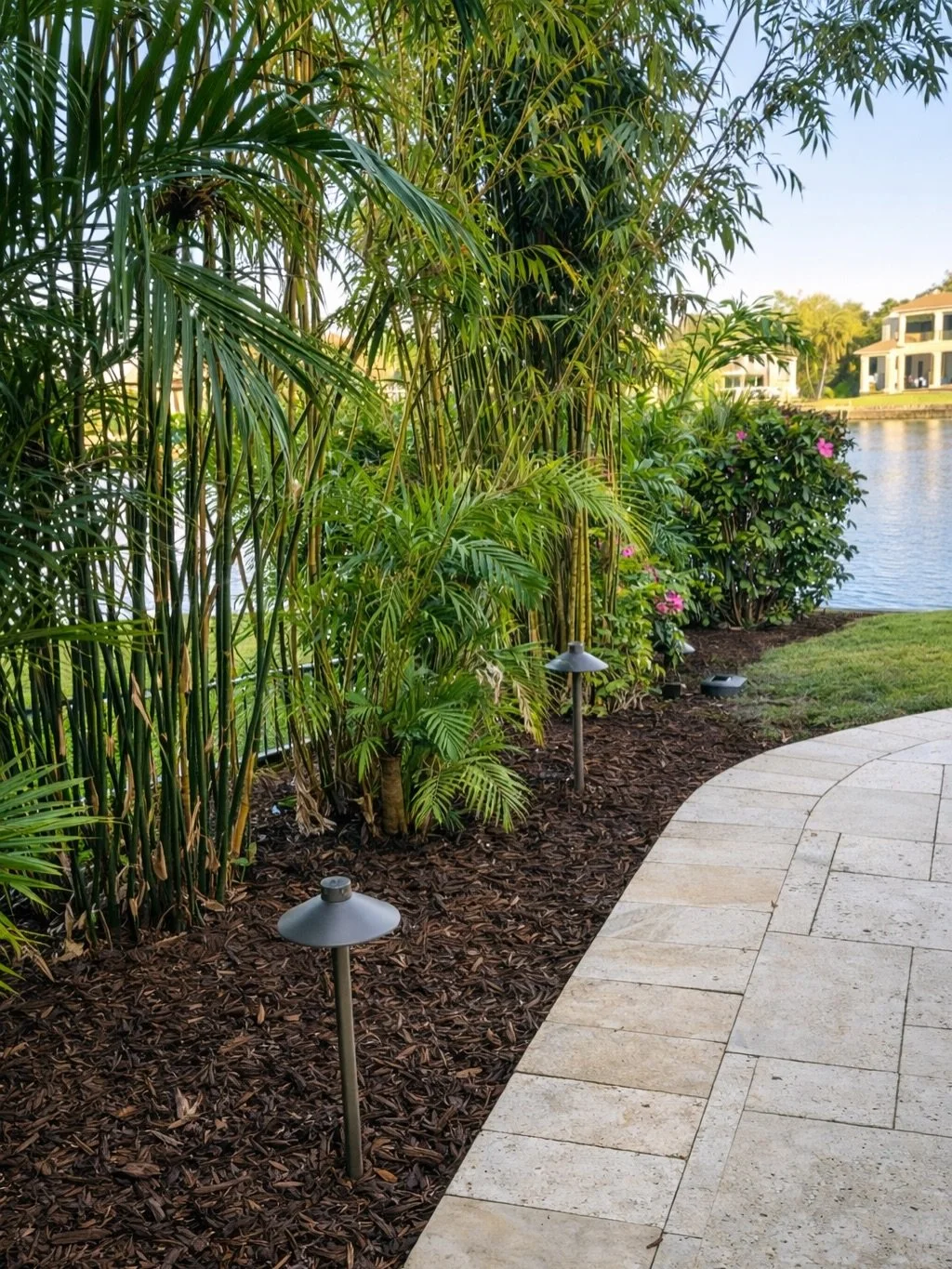 A recently completed landscape cleanup, mulch installation, and low-voltage lighting project in the beautiful Snell Isle, St. Petersburg.

This thoughtfully executed project included 36 low-voltage landscape lights, 17 cubic yards of premium cypress 