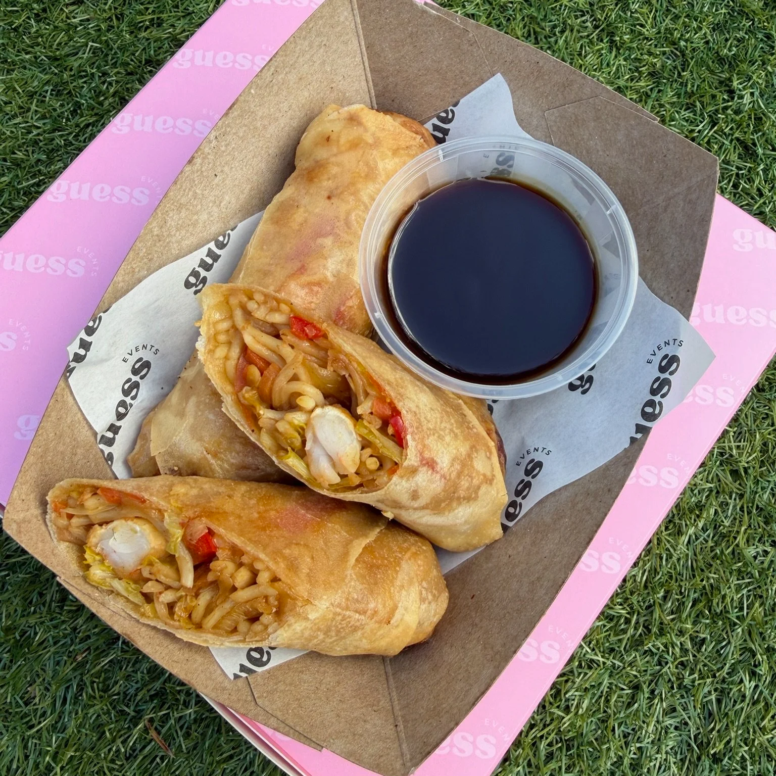 Guess Events exclusive prawn chow main spring rolls with teriyaki sauce, unique evening wedding food and event catering in Devon and the South West UK