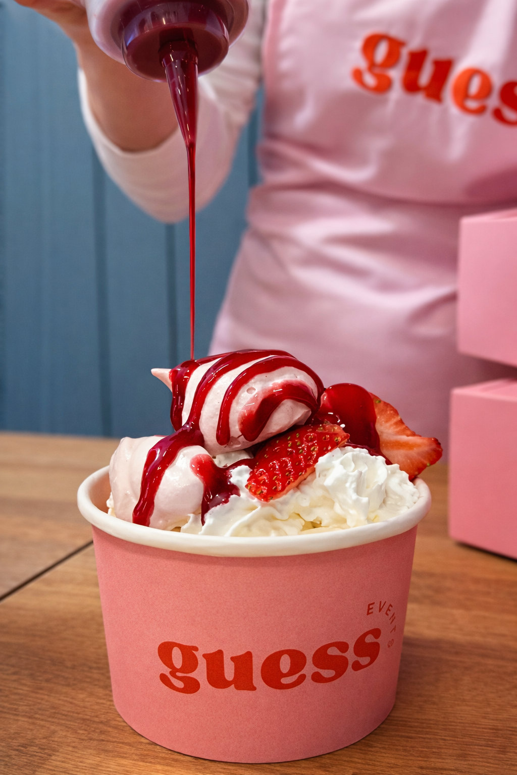 Eton mess showing meringue, strawberries, cream and whipped cream on a guess events pot, served from their dessert bar.