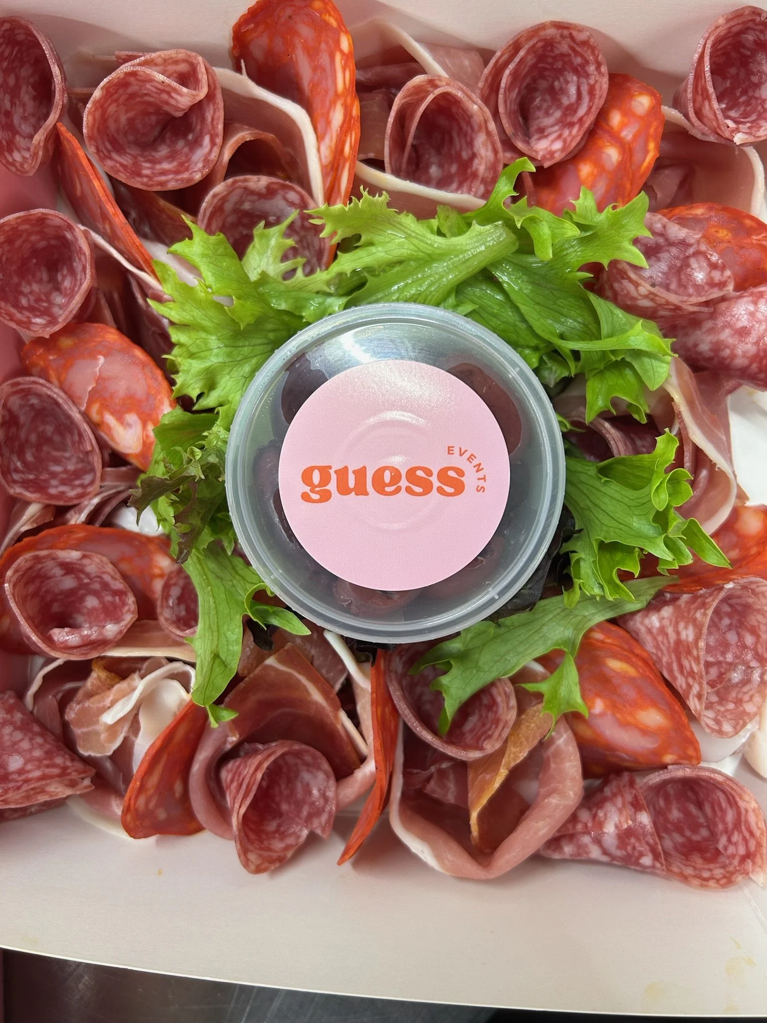 The Guess Events Jam packed afternoon tea hamper with a range of cured meats, frittata, freshly baked breads and sweet treats. A luxury lunch picnic hamper for weddings and events across North Devon, Devon and Cornwall.