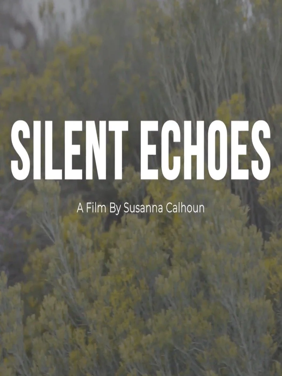 Title screen of the film "Silent Echoes" by Susanna Calhoun, over a blurred background of trees with yellow leaves.