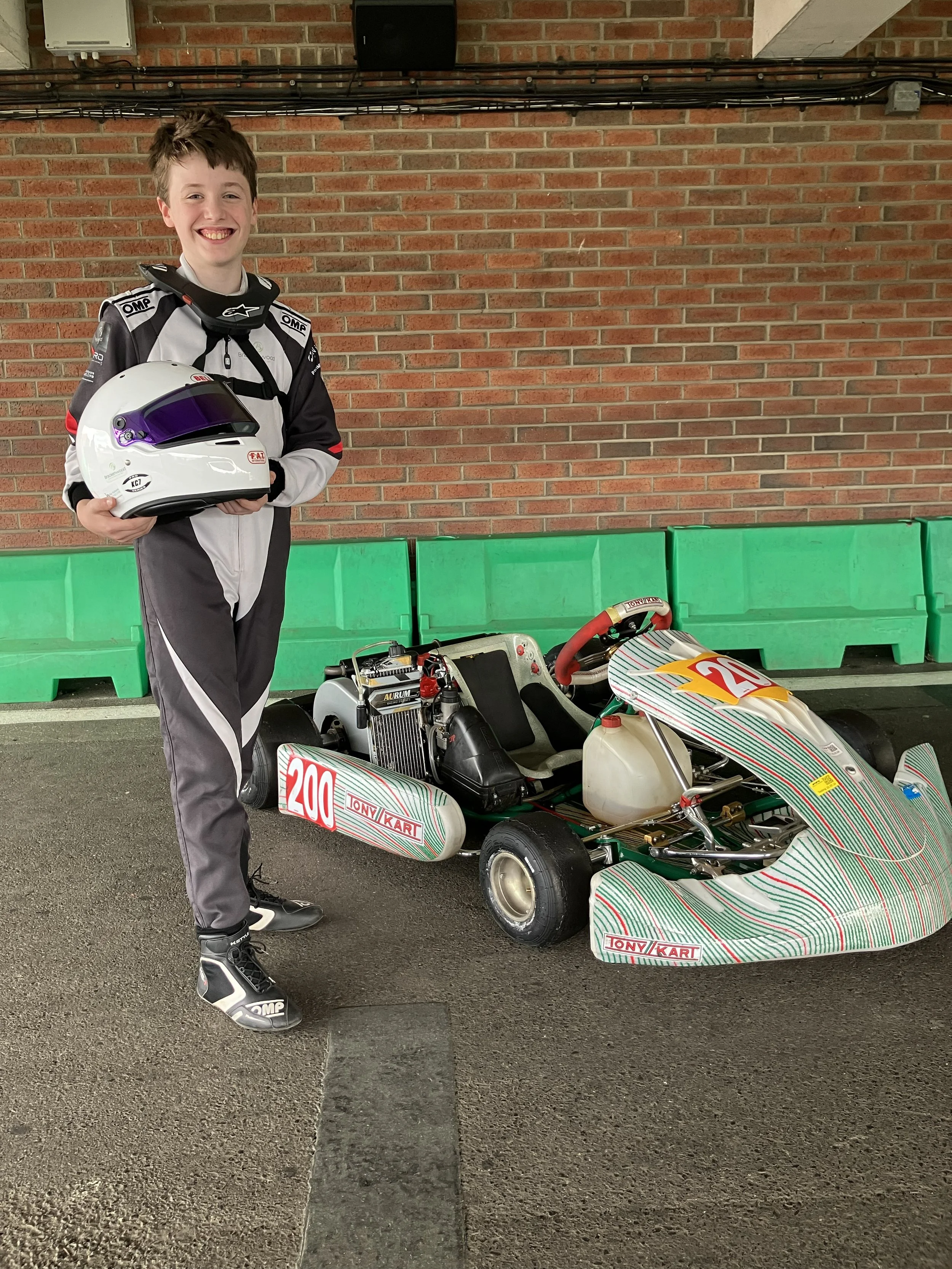 With kart in pit.jpg