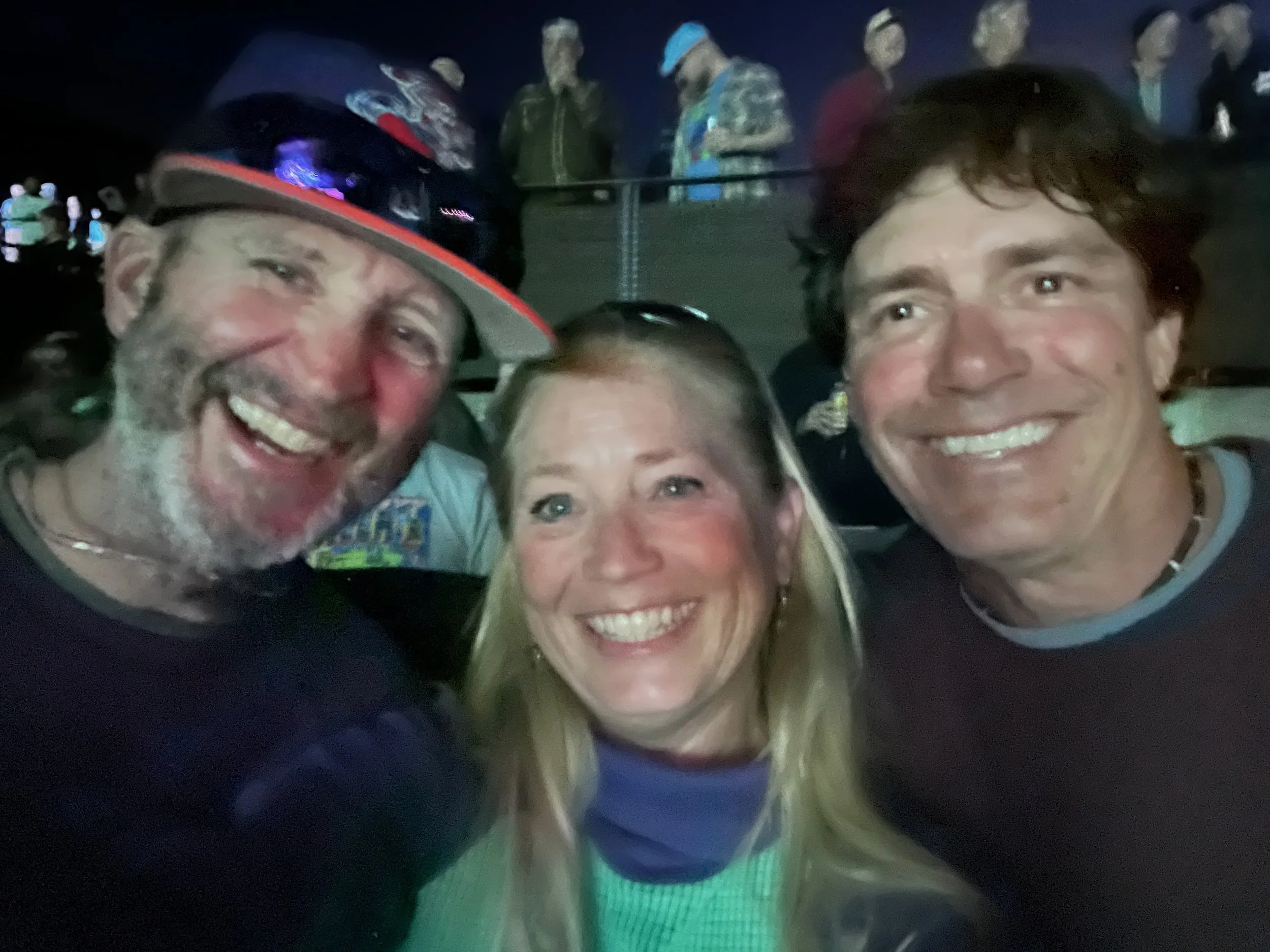 Three friends at a Goose concert at KettleHouse Amphitheater in Montana
