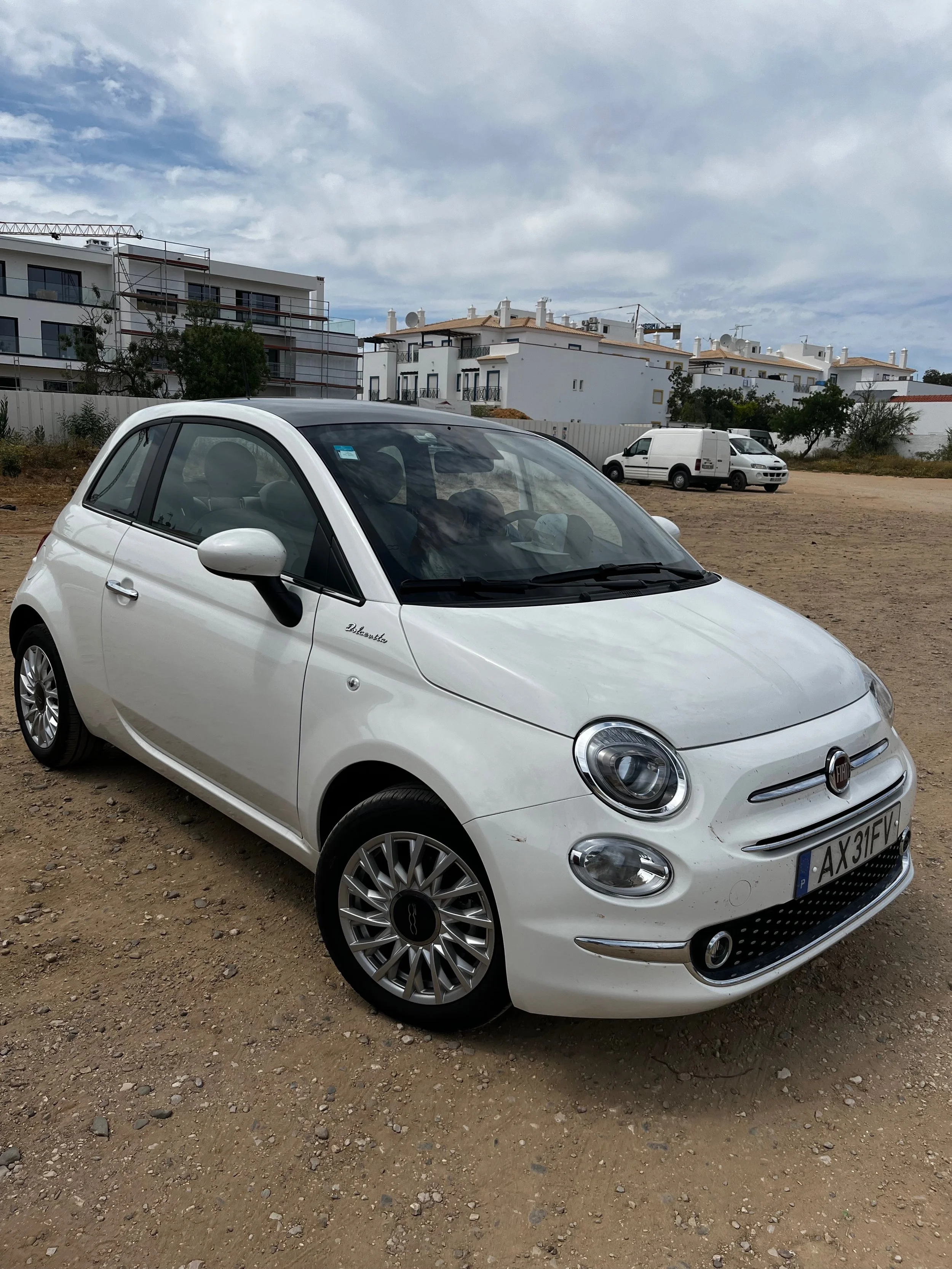 White Fiat rental car used for a road trip from Lisbon, Portugal