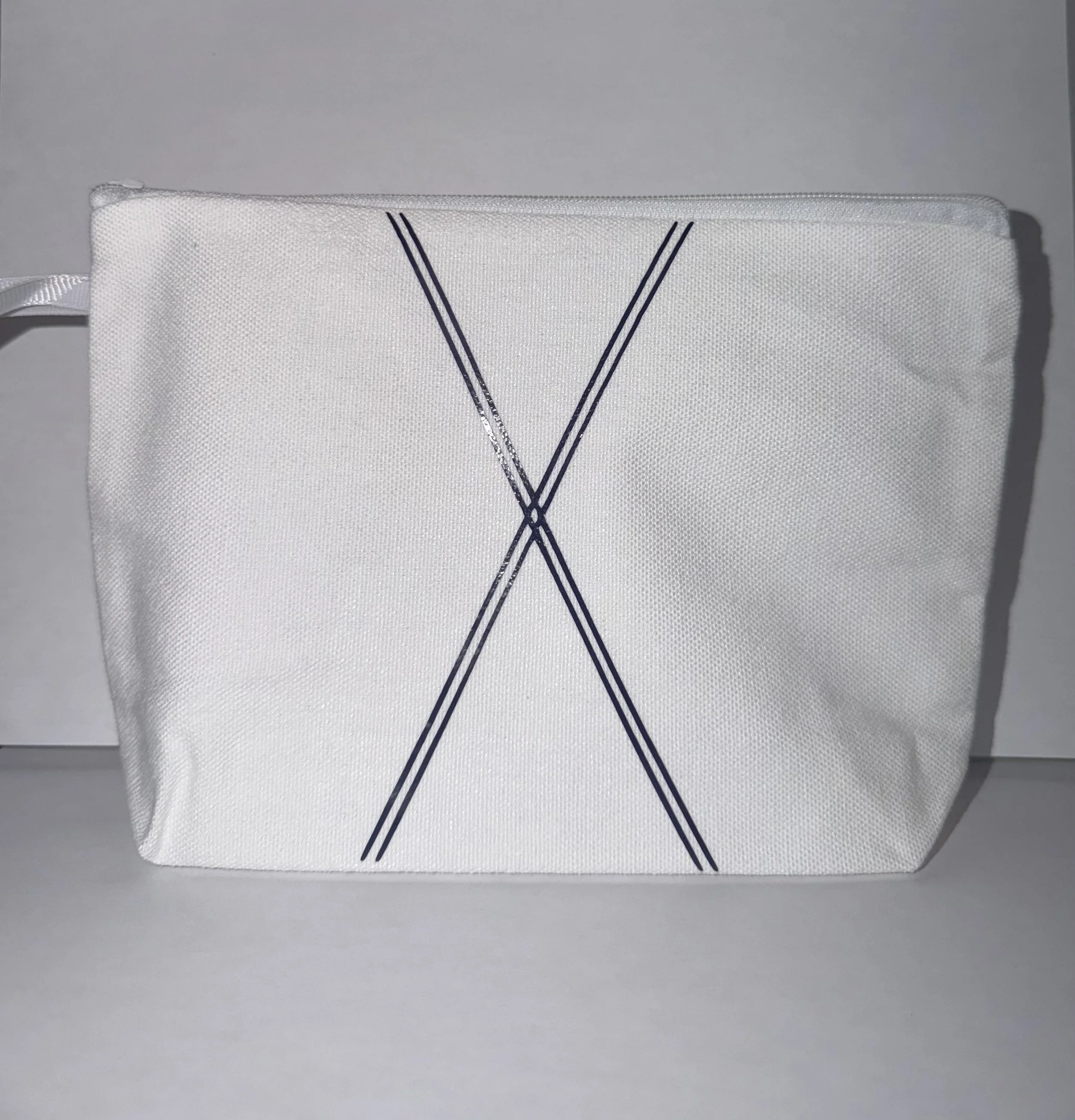 EVERYDAY CANVAS POUCH - X