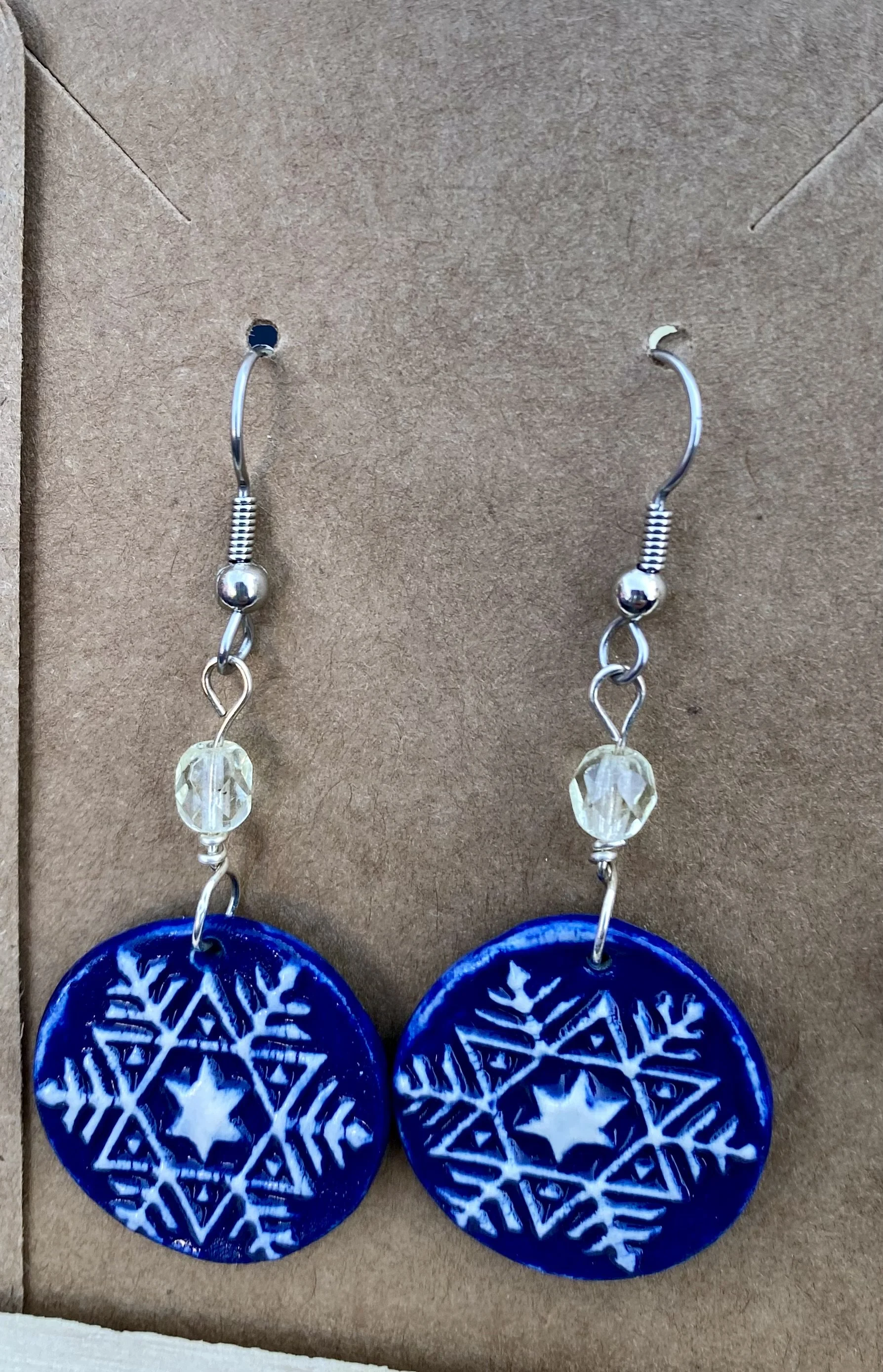 Snow flake dangle earrings dark blue