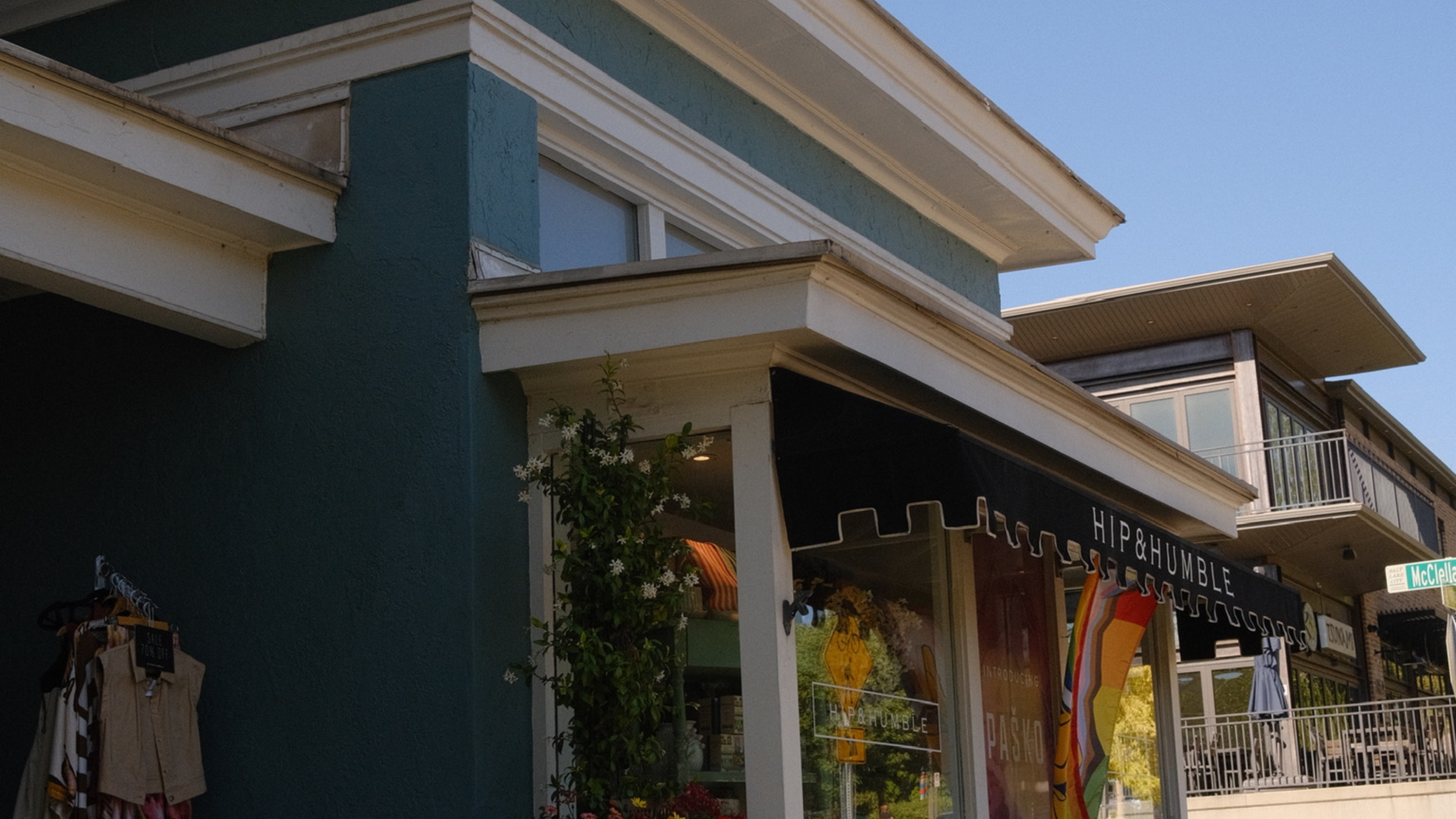 Boutique storefront in a walkable Utah neighborhood, highlighting the vibrant local businesses and community amenities that often matter more to homebuyers than housing market headlines.