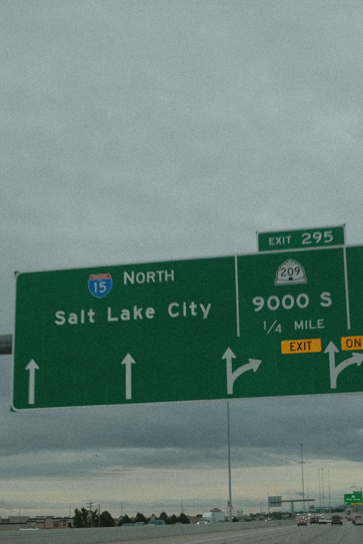 Interstate 15 highway sign leading to Salt Lake City, symbolizing planning a move to Utah in 2026 and exploring Salt Lake City neighborhoods.