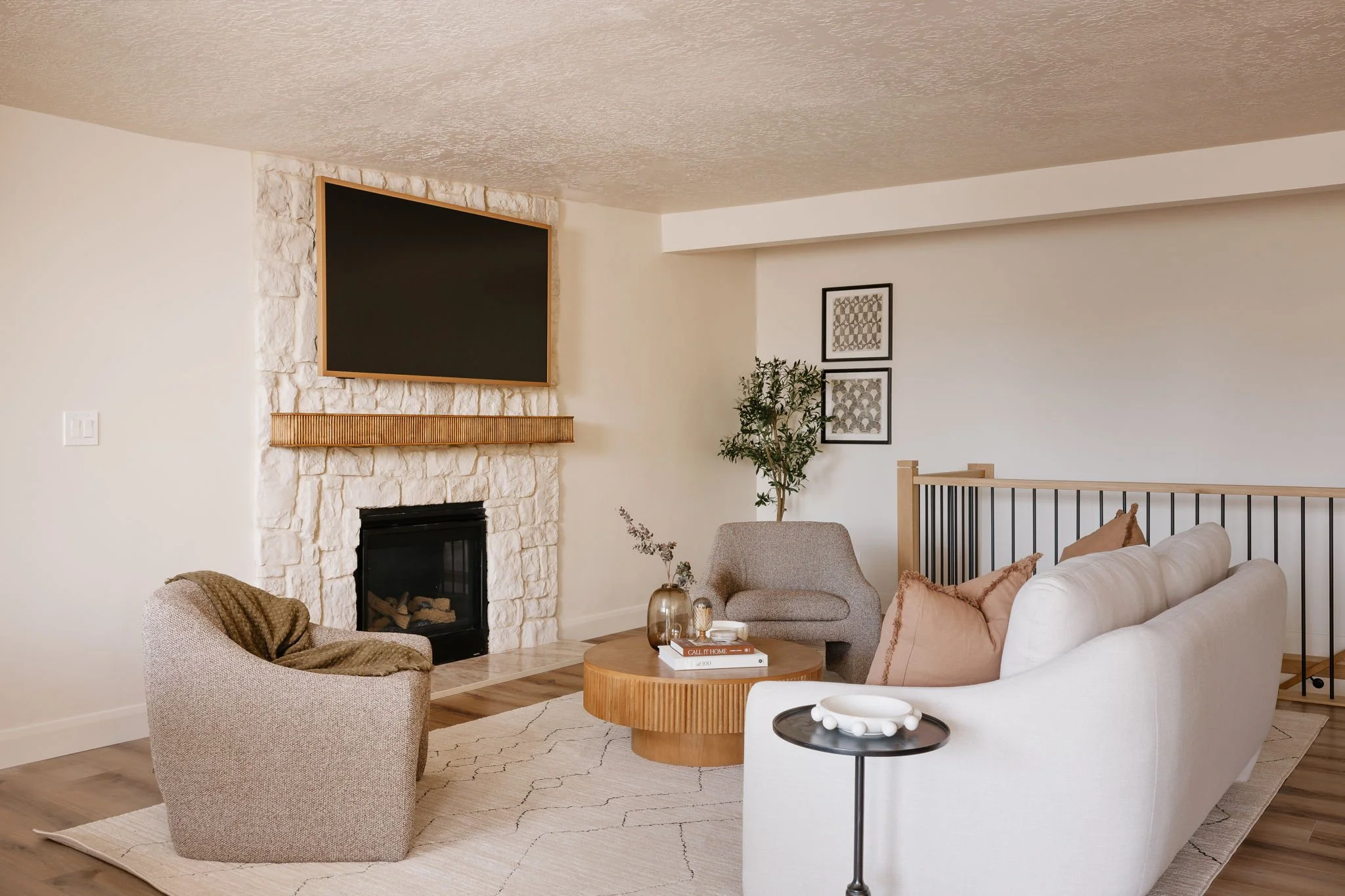 Bright modern living room in a luxury Utah home, reflecting the lifestyle many buyers seek when relocating to Holladay and Salt Lake City in 2026.