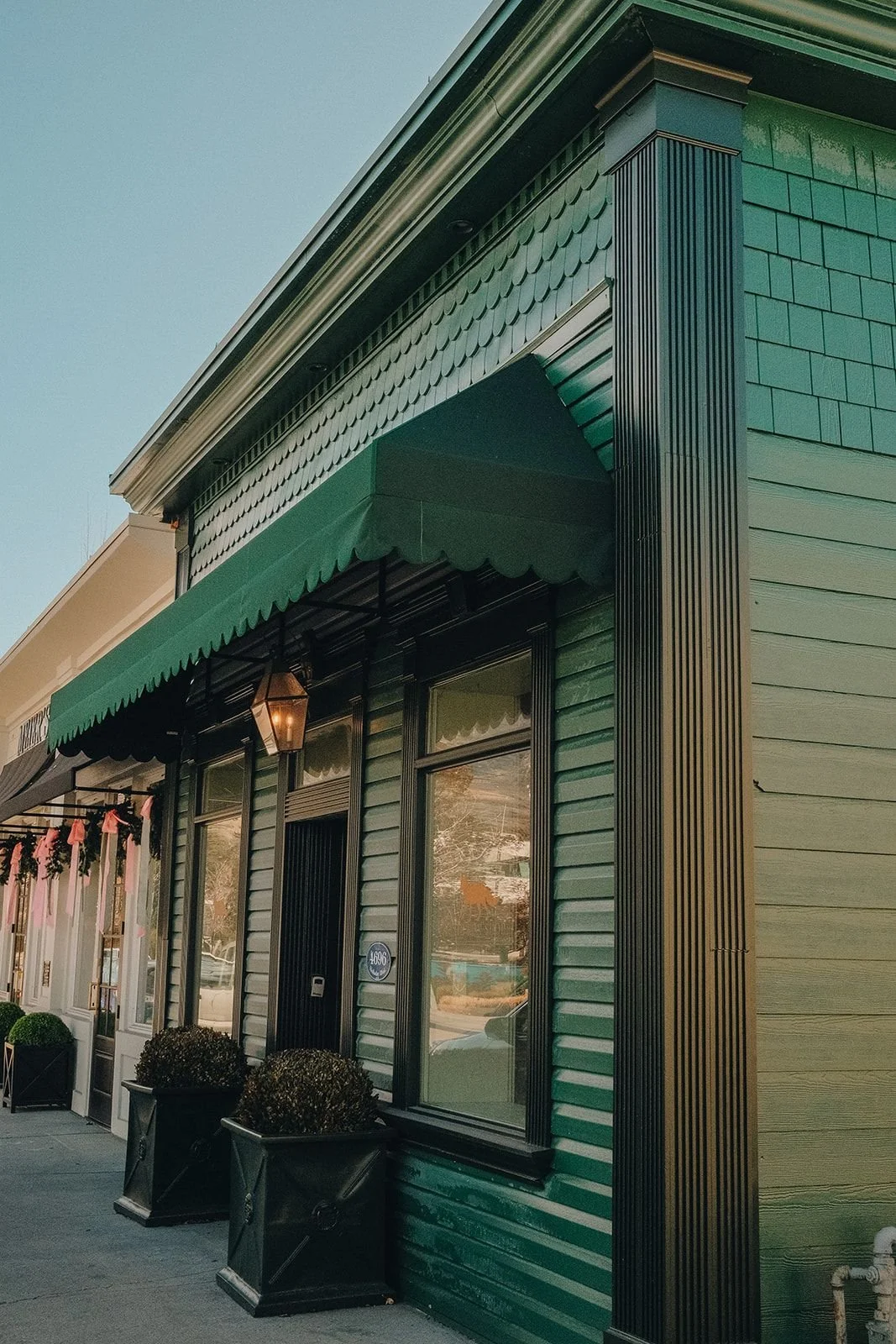 A rich forest green storefront in Salt Lake City, Utah.